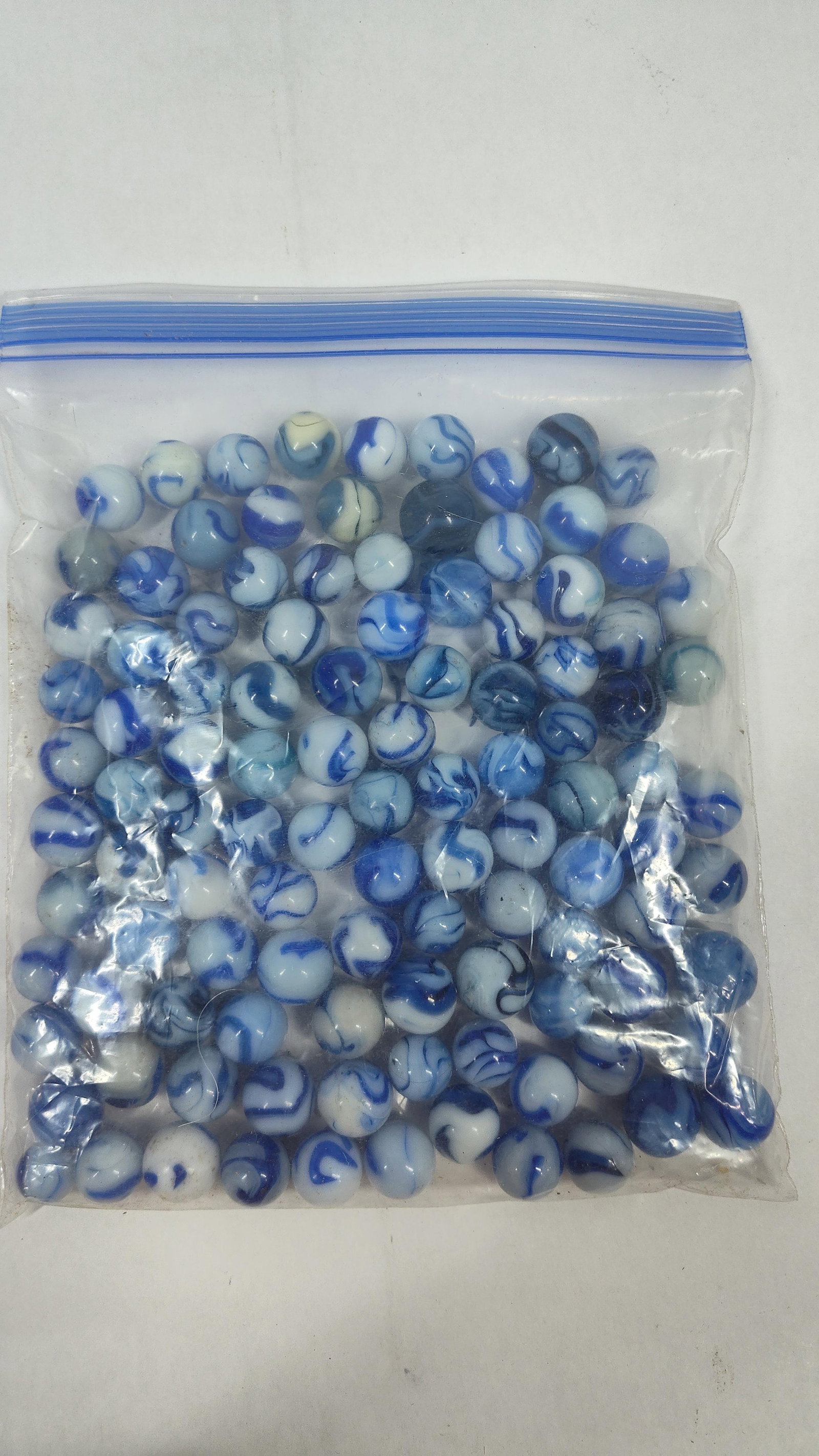 Vtg Blue & White Swirl & Patch Glass Marbles (1 of 2)