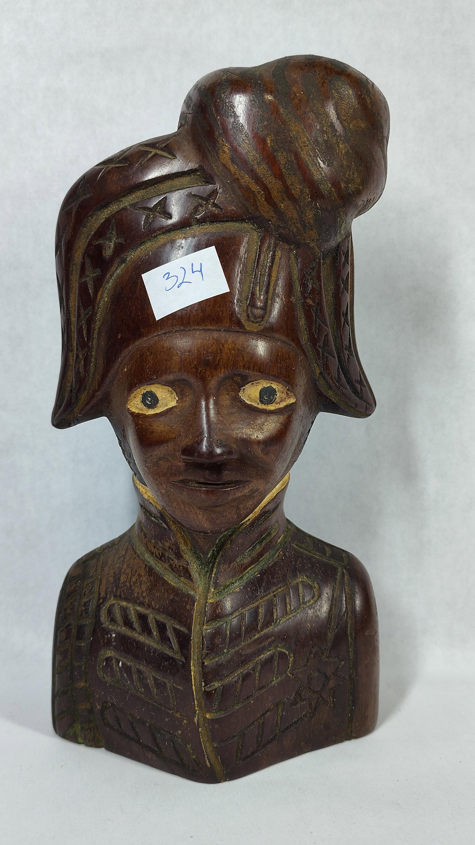 Attr. Ulysse Dabouze Haitian Wood Military Bust: A hand-carved wooden bust representing a military figure, attributed to the 19th-century Haitian artist Ulysse Dabouze. The sculpture depicts a figure wearing a high-collared tunic with incised
