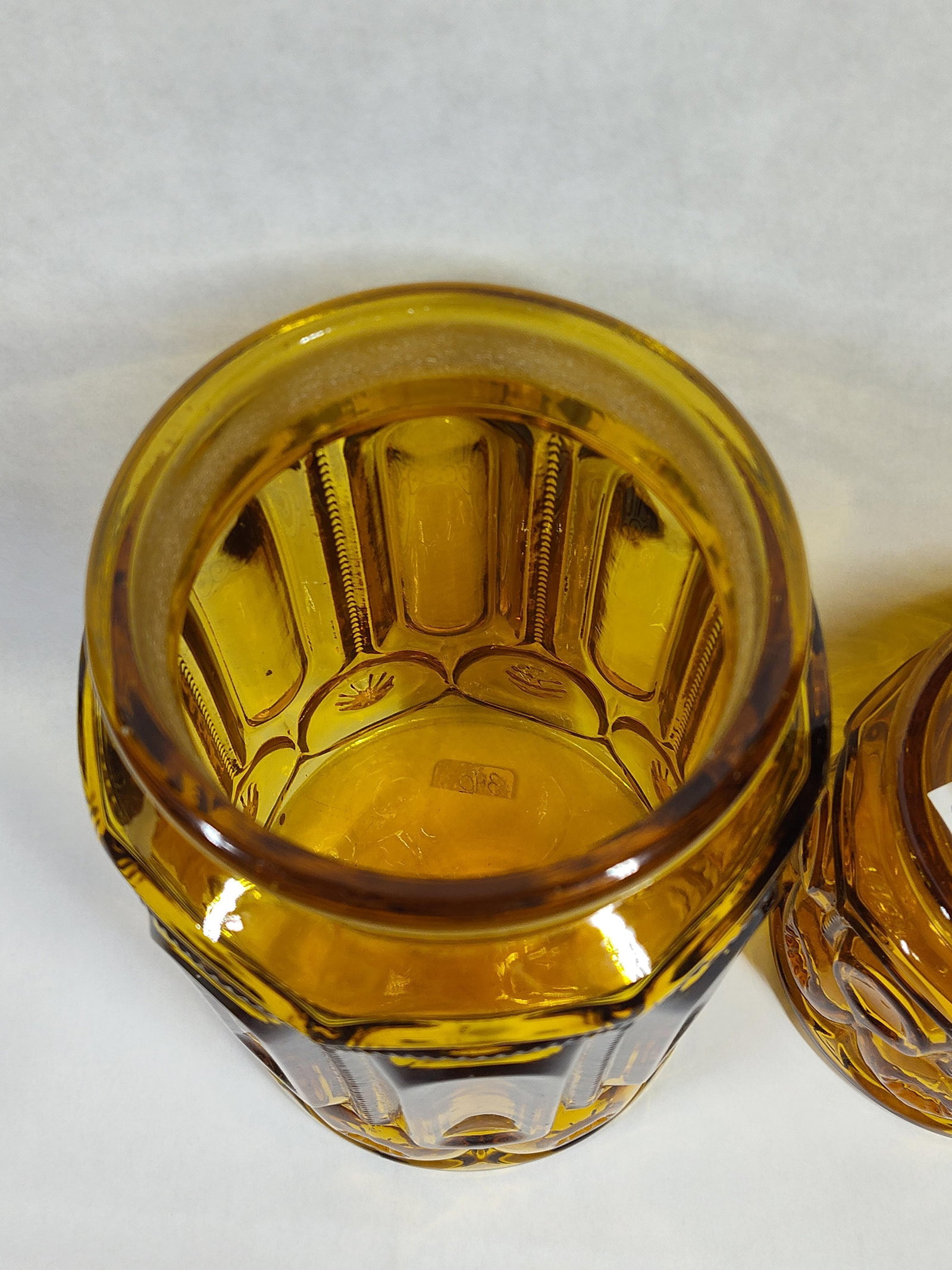 Pair Moon & Star Pattern Amber Glass Canisters - 2