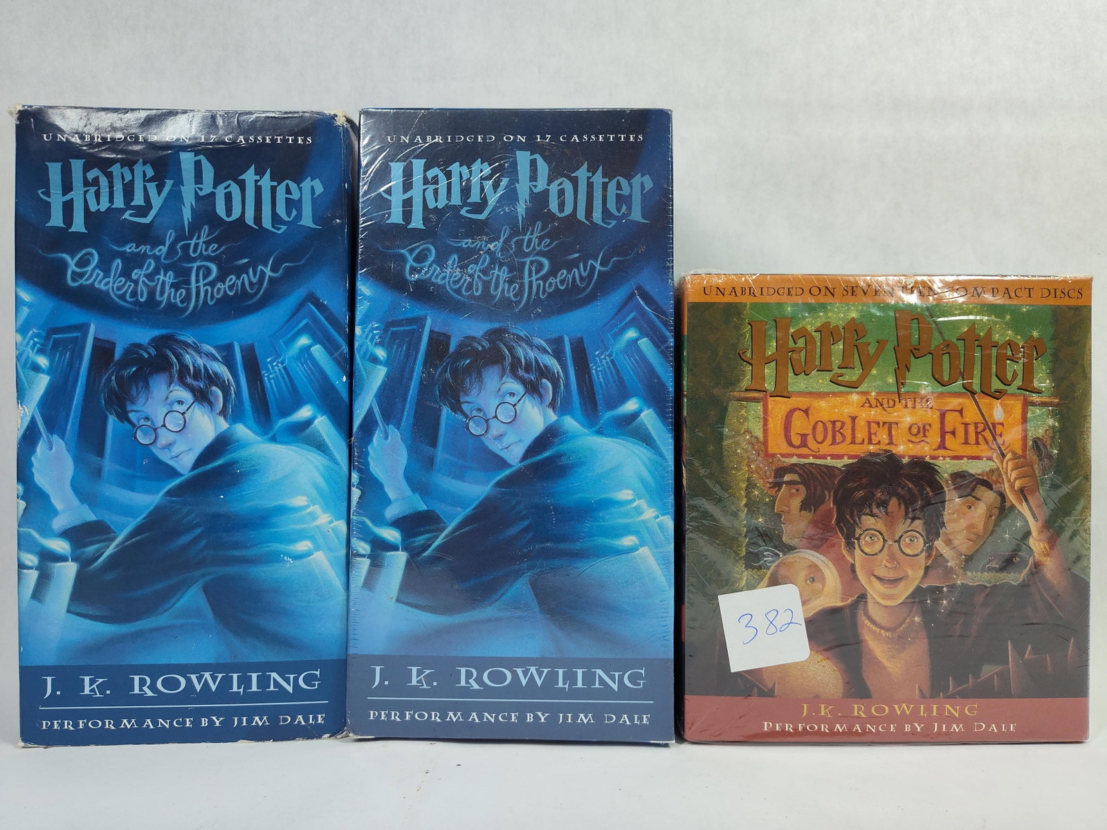 3 Harry Potter Unabridged Audiobook Sets, Jim Dale: This lot consists of three unabridged audiobook boxed sets of J.K. Rowling Harry Potter novels, featuring performances by narrator Jim Dale. The collection includes two copies of Harry Potter and the