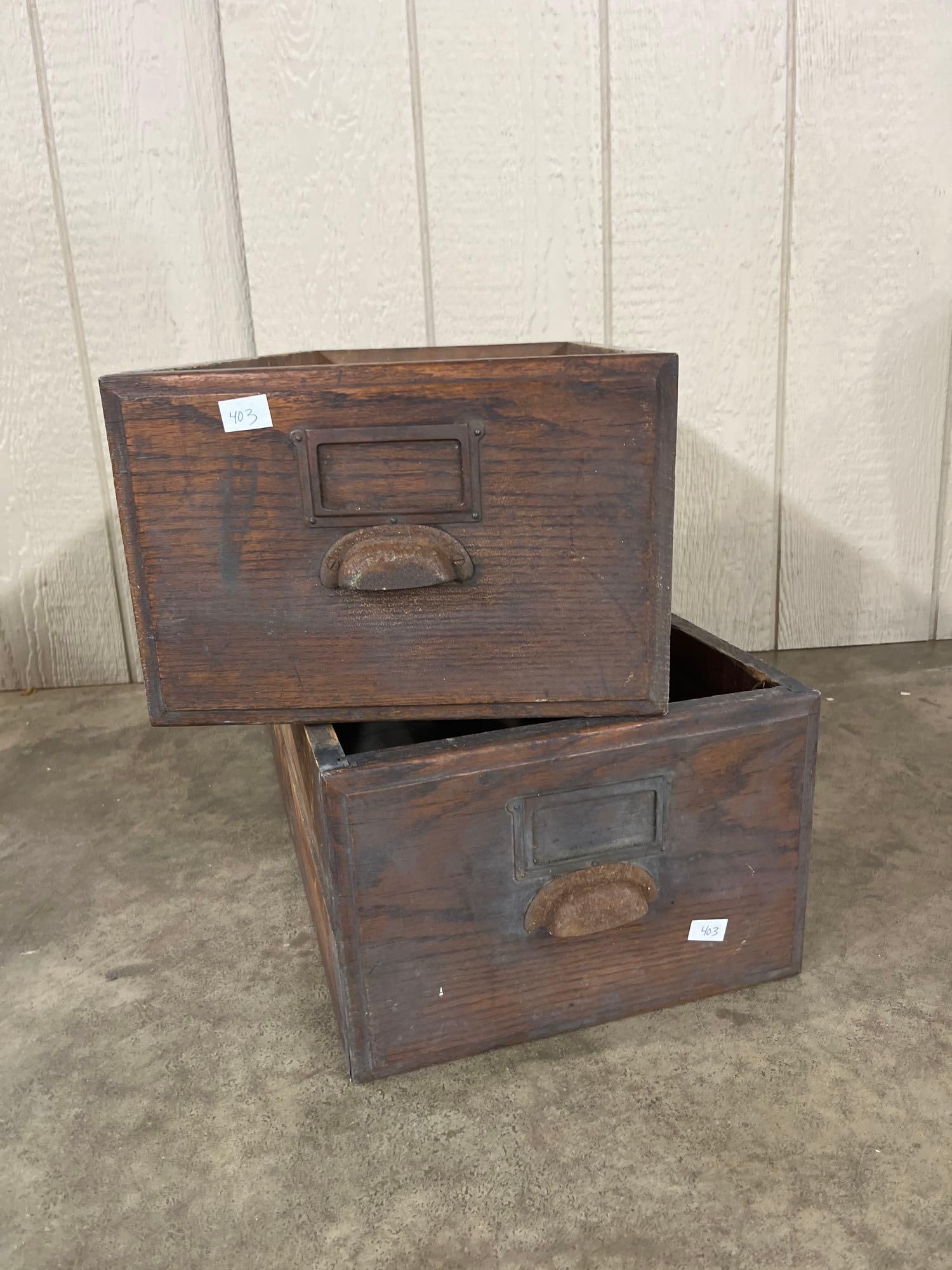 Pair Vtg Industrial Wood Index Card Filing Drawers: A matching pair of vintage industrial wooden drawers designed for index card or document filing. The drawers are of solid wood construction with a dark stained finish. Each front panel features a