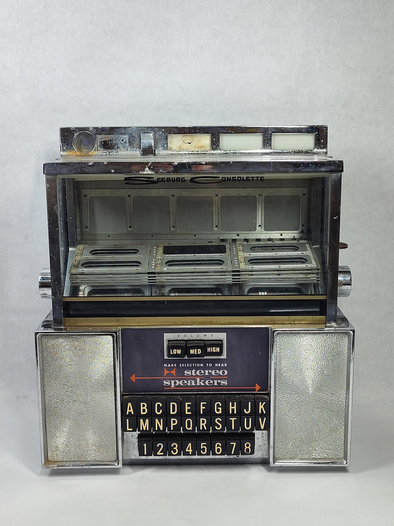 Seeburg Consolette SC-1 Jukebox Wallbox Selector: A Seeburg Consolette Type SC-1 jukebox wallbox remote selector unit manufactured by The Seeburg Corporation of Chicago, Illinois. This mid-century device was designed for mounting at diner tables or