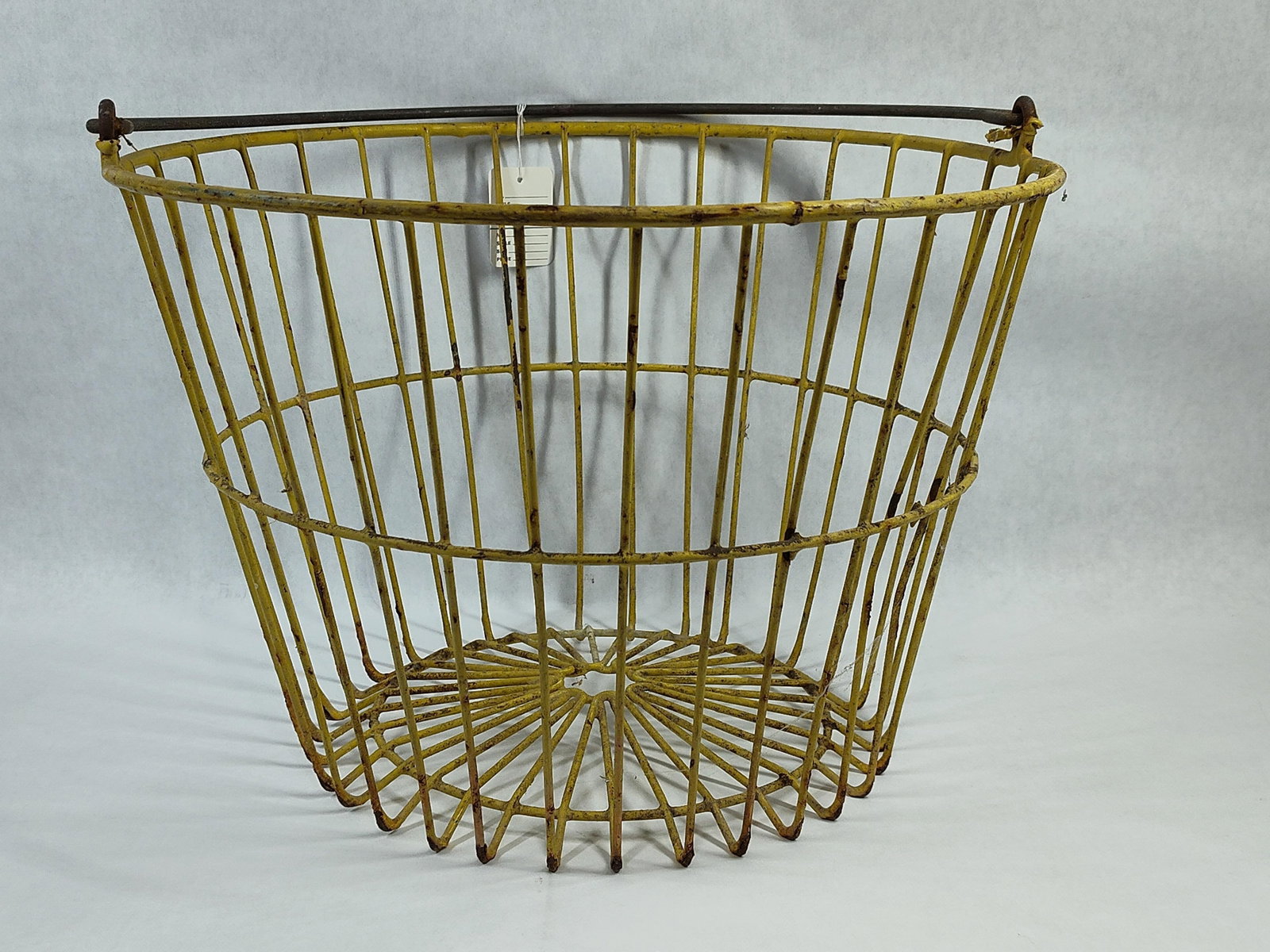 Vtg Industrial Yellow Wirework Gathering Basket: A vintage industrial-style wirework basket featuring a flared cylindrical body. The piece is constructed from vertical iron or steel wire ribs reinforced by two horizontal rings and a thickened wire