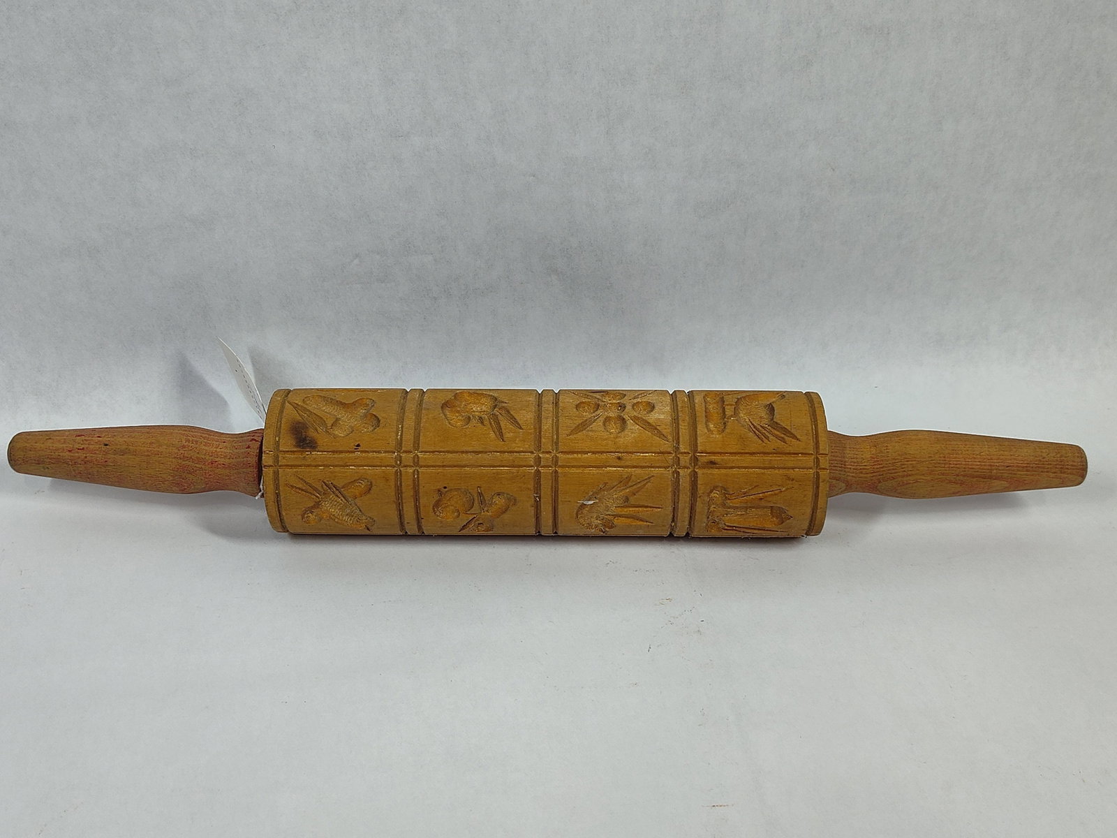 Vintage Carved Wood Springerle Cookie Rolling Pin: This vintage kitchen tool is a traditional Springerle or patterned cookie rolling pin, likely carved from maple or beech wood. The central barrel is divided into a grid of twelve rectangular panels, e