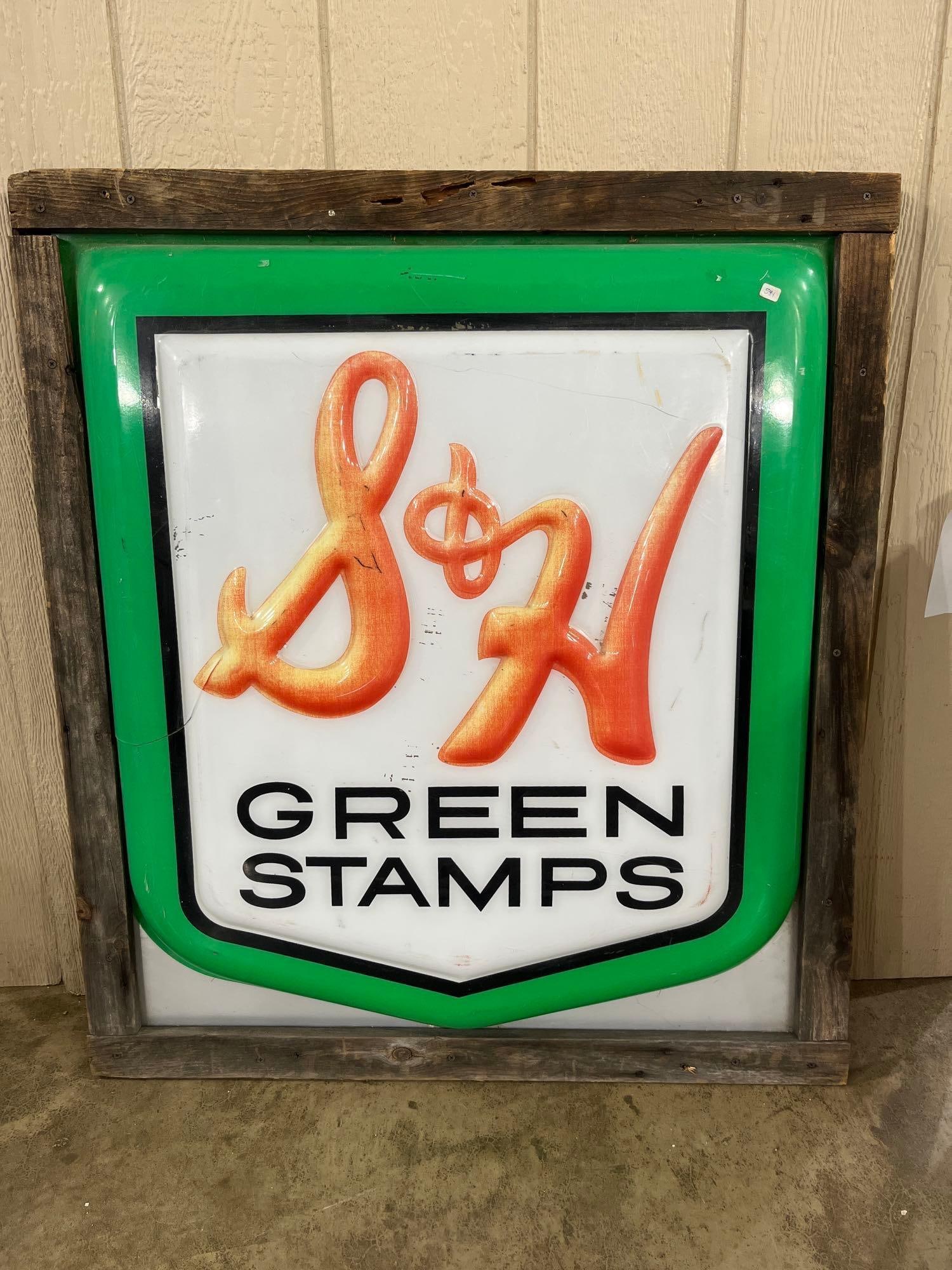 S&H Green Stamps Vacu-Formed Plastic Sign w/ Frame: This is a vintage mid-20th century advertising sign for S&H Green Stamps, a brand of the Sperry and Hutchinson Company. The item consists of a single-sided, vacu-formed translucent plastic panel,