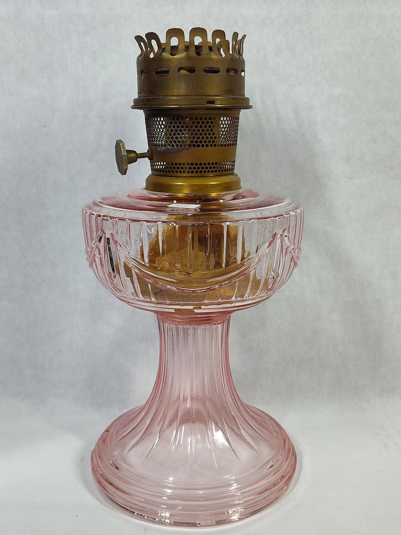 Pink Glass Oil Lamp in the Lincoln Drape Pattern (1 of 3)