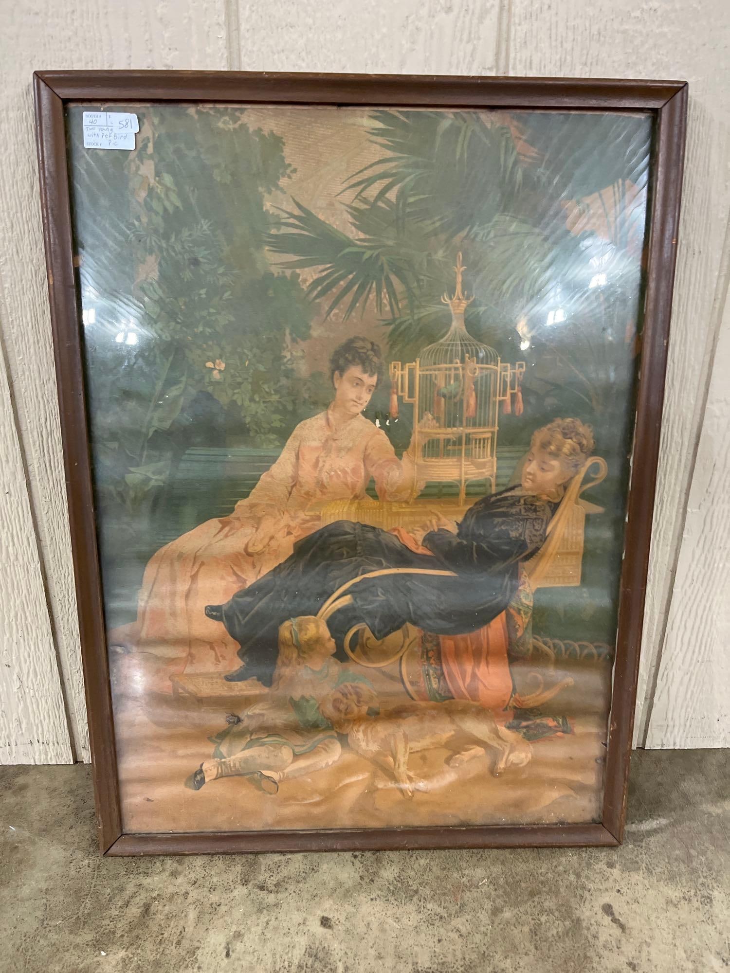 Pair Interior & Coaching Scenes Chromolithographs: This lot comprises two framed color prints, identified as chromolithographs from the late 19th to early 20th century. The larger print depicts a Victorian-era garden or conservatory scene with two