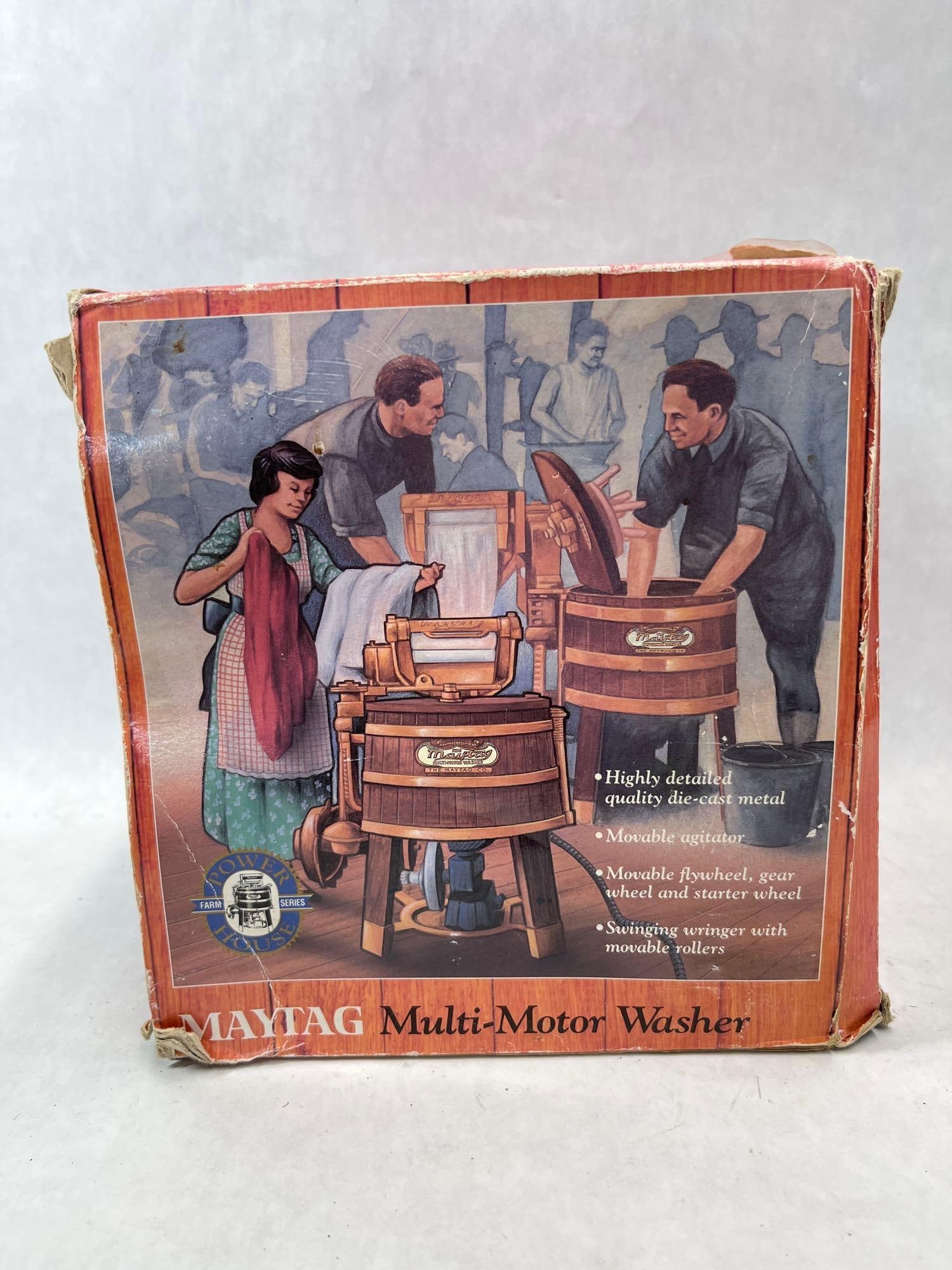 ERTL Maytag Multi-Motor Washer Die-Cast No. 4967: This 1/6 scale model is a die-cast metal reproduction of the Maytag Multi-Motor Washer, manufactured by ERTL as part of the Power House Farm Series. Part of the Maytag Heritage collection, the model