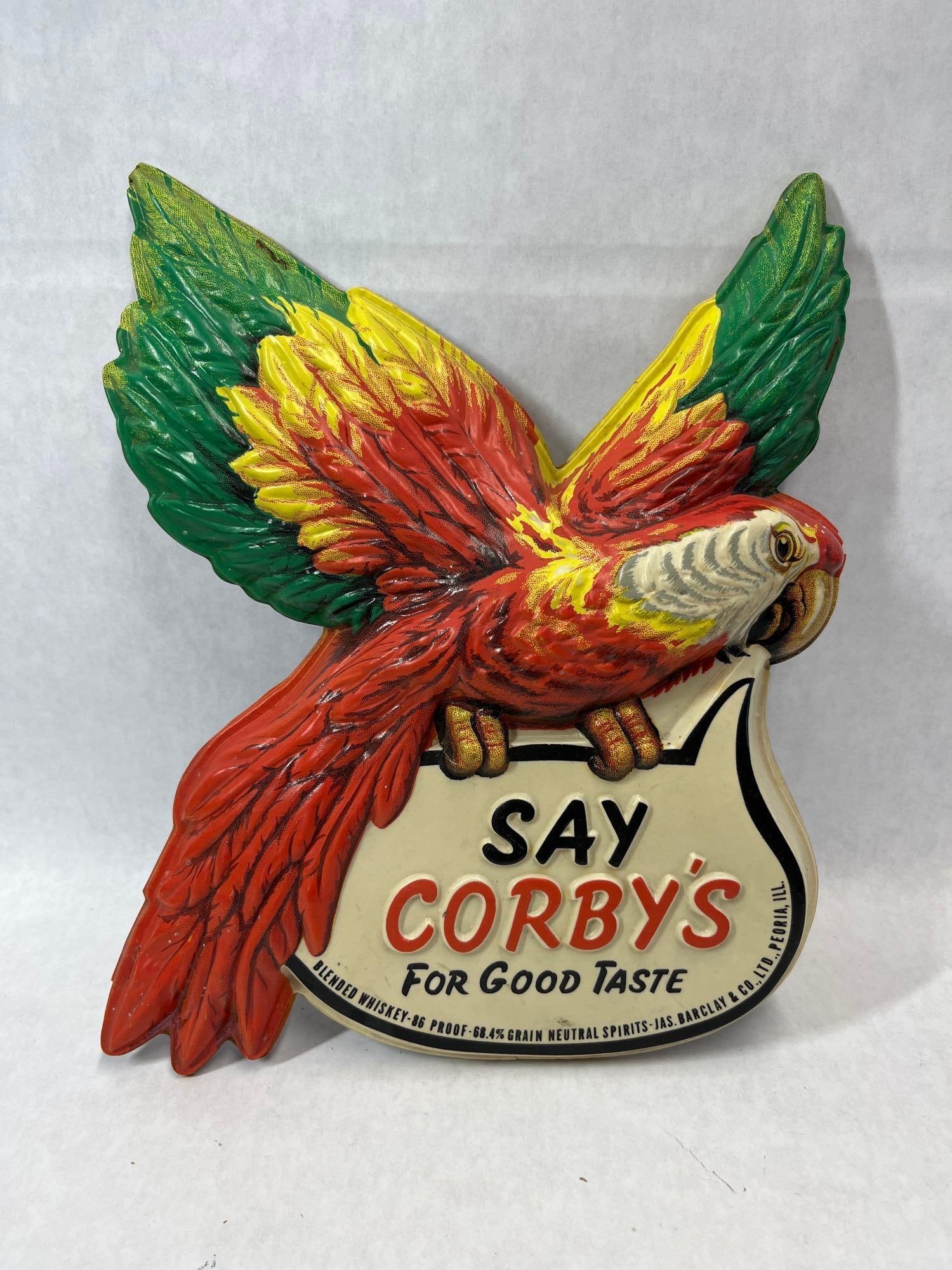 Corby's Whiskey Molded Plastic Parrot Sign: This point-of-sale advertising display features the iconic parrot mascot for Corby's Blended Whiskey. The three-dimensional sign is constructed from vacuum-formed molded plastic or celluloid and