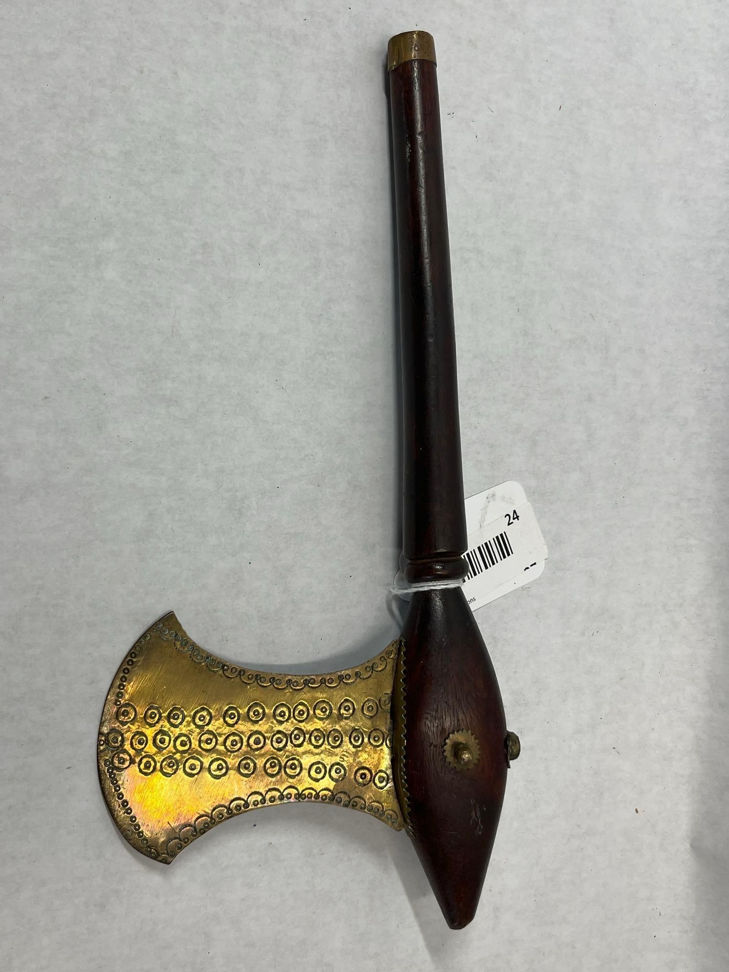 African Songye or Luba Ceremonial Prestige Axe: This ceremonial prestige axe, commonly referred to as a kilonda, is characteristic of the metalworking traditions of the Songye or Luba peoples of the Central African region. The item features a