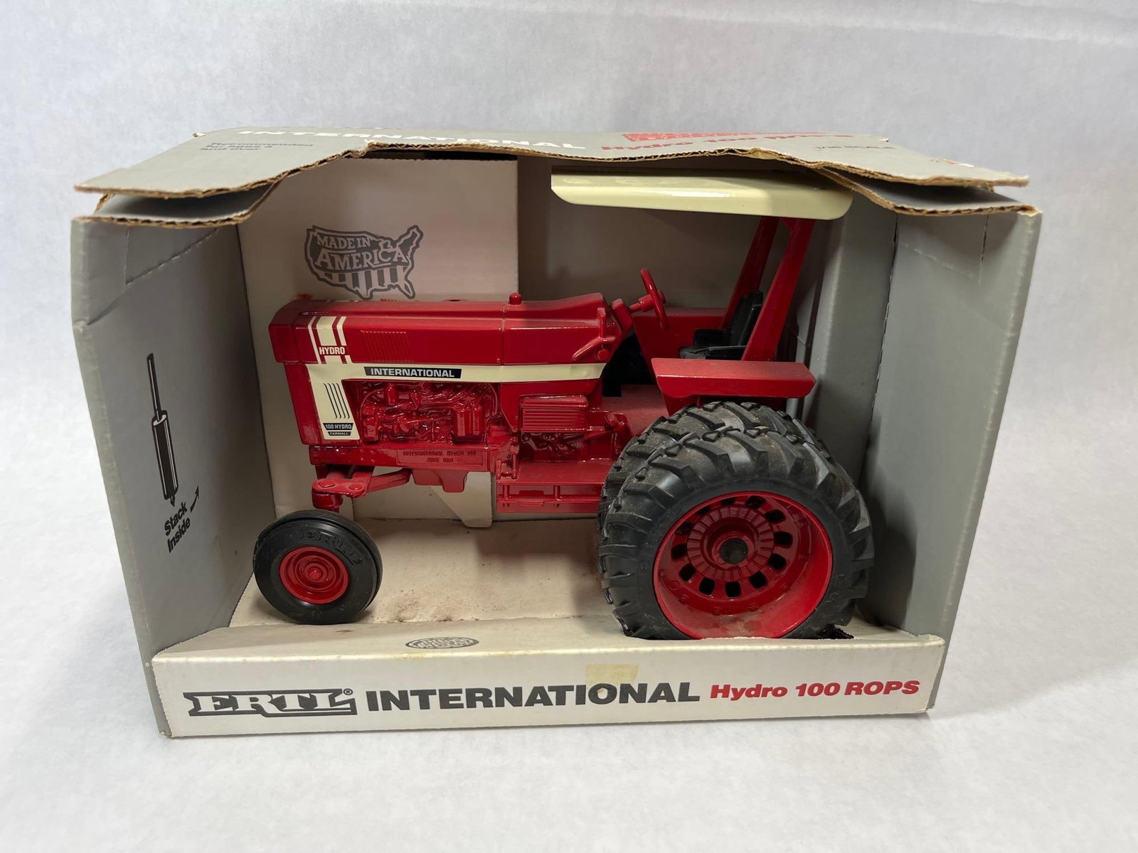 1991 Ertl International Hydro 100 ROPS Tractor: This is an Ertl 1/16 scale model of an International Hydro 100 tractor with ROPS (Roll-Over Protective Structure), released as part of the Special Edition International 66 Series. The tractor is