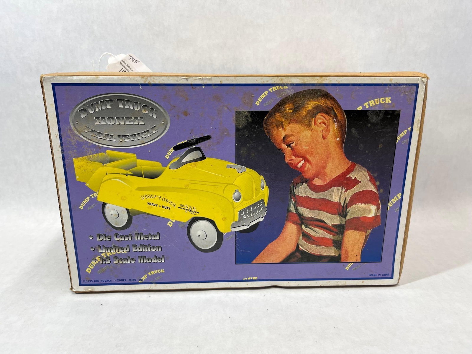 Xonex Ken Kovach 1:3 Dump Truck Pedal Car Model: A 1:3 scale die-cast metal model reproduction of a -style pedal vehicle manufactured by Xonex and designed by Ken Kovach. This model represents a No. 742 Jet Flow Drive heavy-duty dump truck finished 