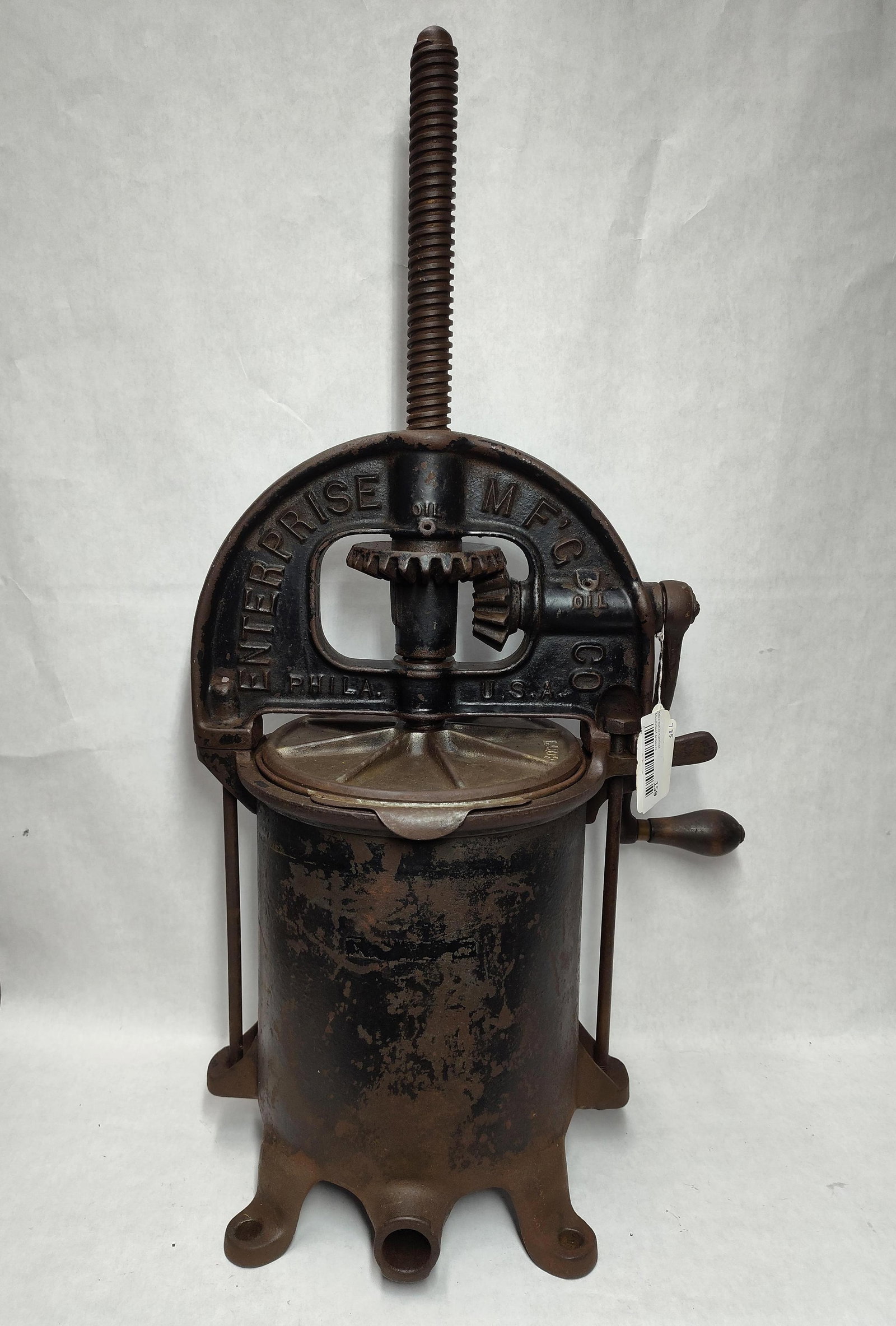 Enterprise Cast Iron Lard Press & Sausage Stuffer: An antique cast iron combination tool manufactured by the Enterprise Manufacturing Company of Philadelphia, Pennsylvania. This heavy-duty piece was designed for multiple kitchen and agricultural funct