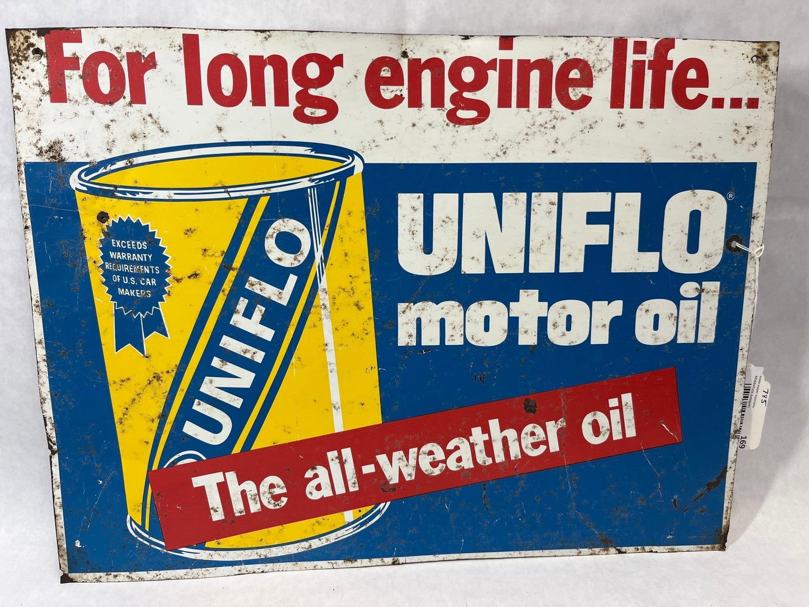 Uniflo Motor Oil Single-Sided Advertising Sign: This is a single-sided metal advertising sign for Uniflo Motor Oil, a brand produced by Esso/Exxon. The sign is constructed from lithographed sheet metal and features a tri-color design. The upper