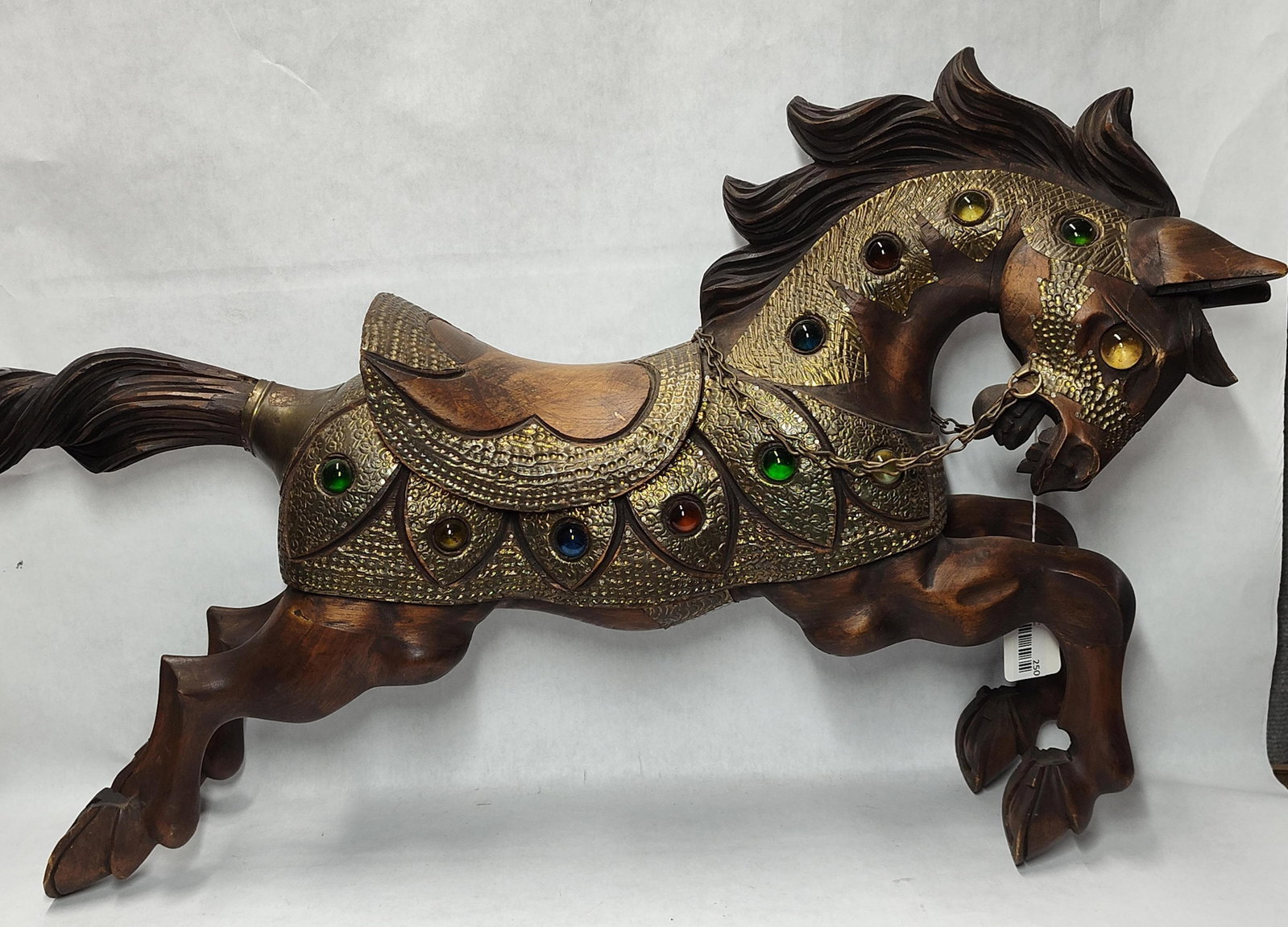 Carved Wood & Embossed Brass Horse w/ Glass Insets: This lot features a large hand-carved wooden horse sculpture in a dynamic leaping or galloping pose. The body of the horse is stained in a dark brown finish with a semi-gloss coating. Decorative
