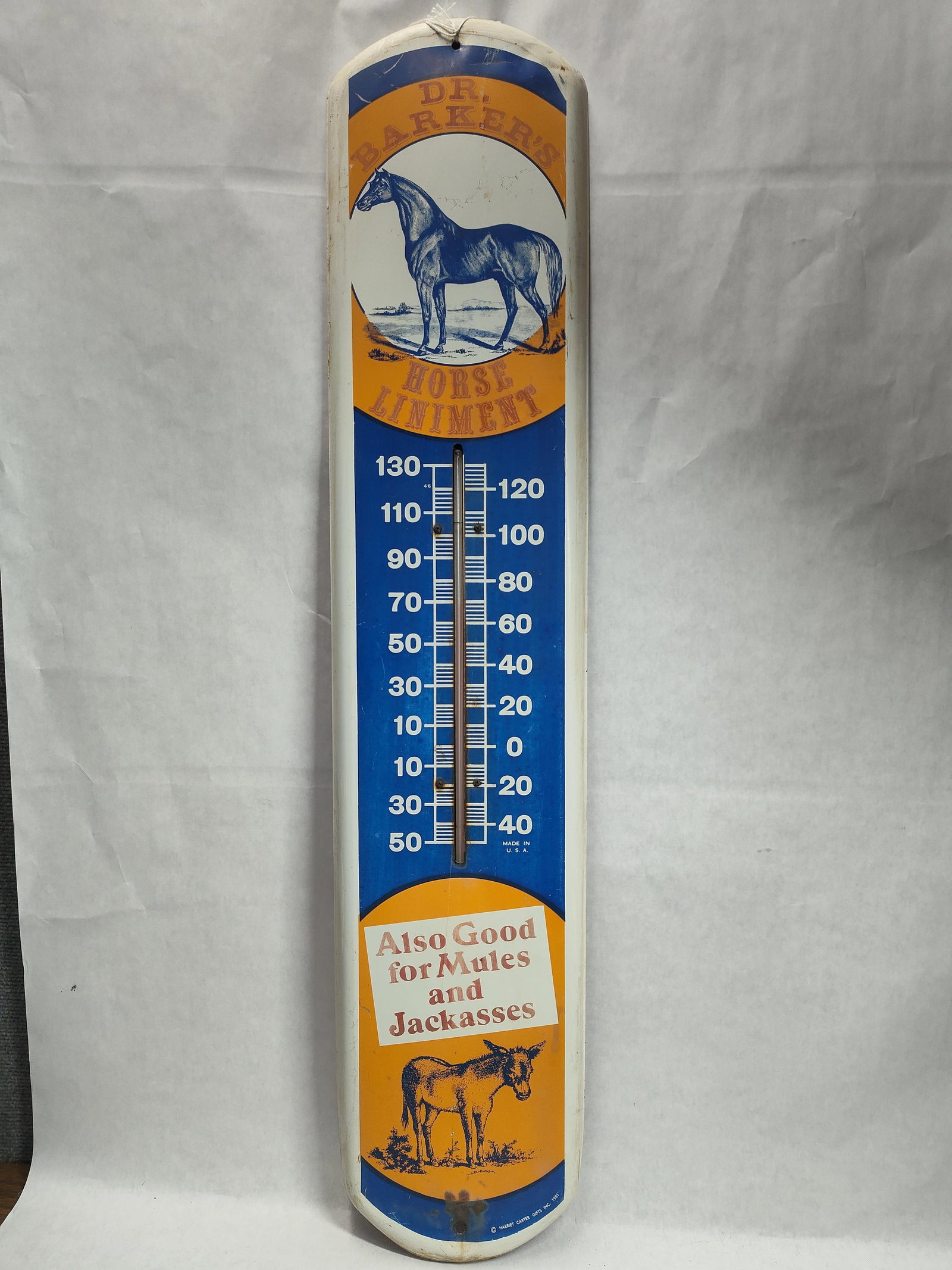 Dr. Barker's Horse Liniment Metal Thermometer 1981: This is a vertical advertising thermometer for Dr. Barker?s Horse Liniment, produced by Harriet Carter Gifts Inc. and dated 1981. The thermometer is constructed from lithographed metal with a color