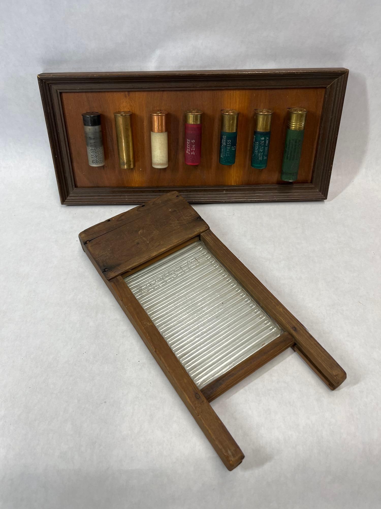 Framed Shotgun Shells & Crystal Glass Washboard: This lot consists of two items of Americana interest. The first is a framed wall display containing seven specialty and dummy shotgun shells mounted on a finished wooden board. An explanatory note is 