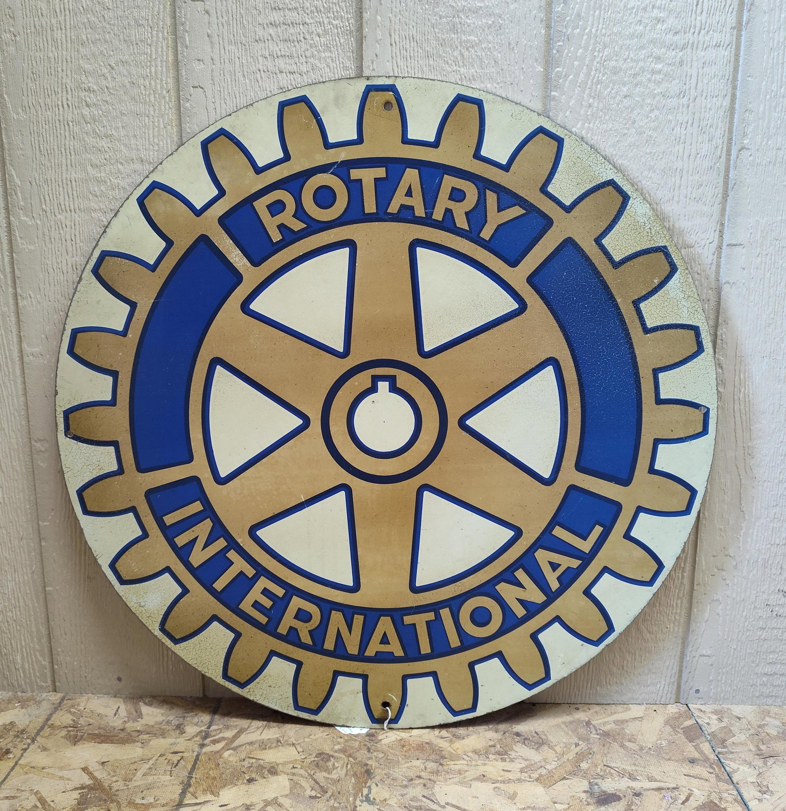 Rotary International Circular Metal Sign: A circular organizational sign for Rotary International, likely intended for outdoor display. The sign is constructed of heavy-gauge metal and features the official Rotary logo, composed of a