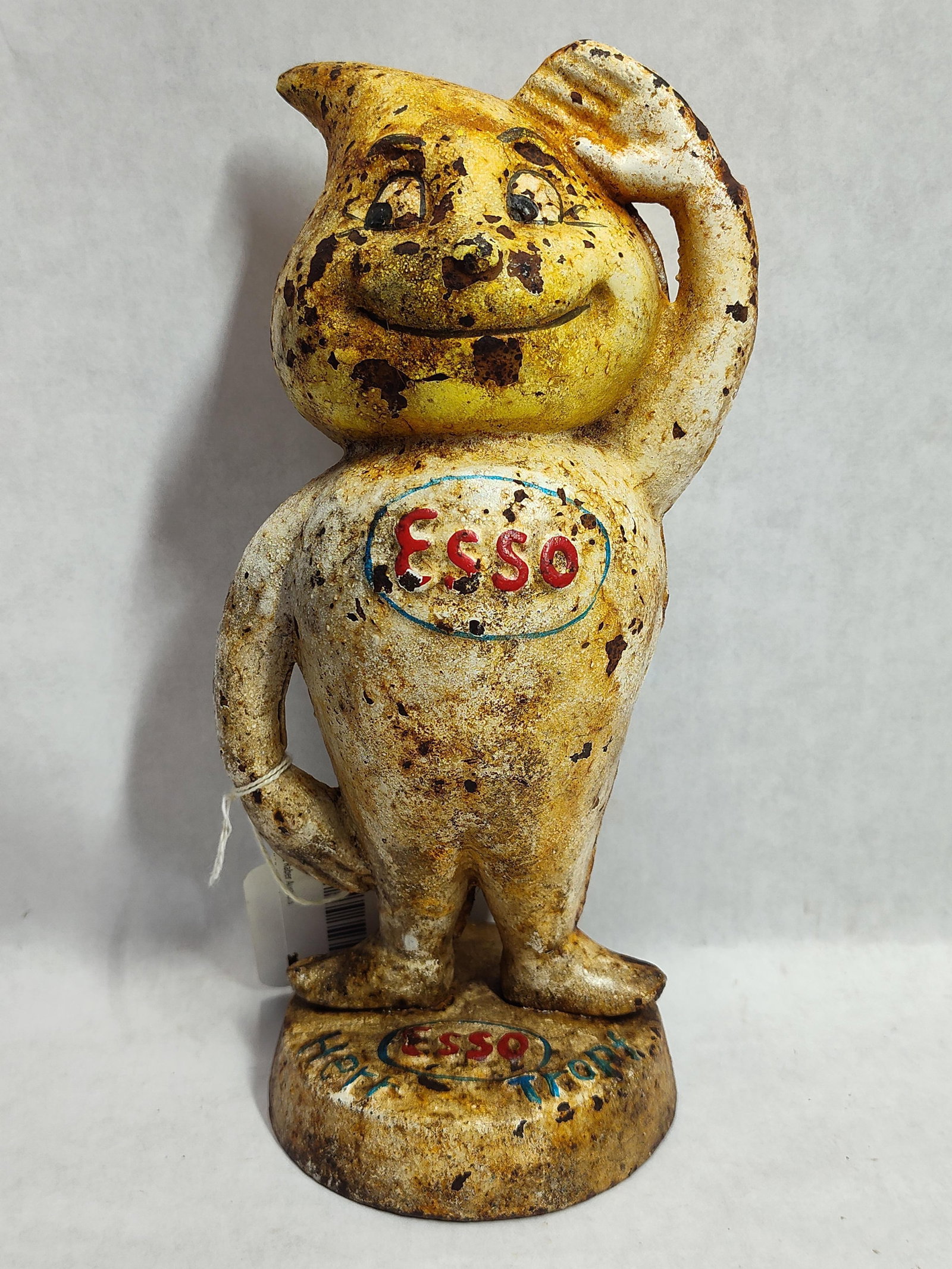 Mibuso GmbH Esso Herr Tropf Figural Coin Bank: Produced by Mibuso GmbH, this figural coin bank depicts the character Herr Tropf (Mr. Drop), the oil drop mascot used by Esso in Germany beginning in the 1950s. The figure is modeled in a standing