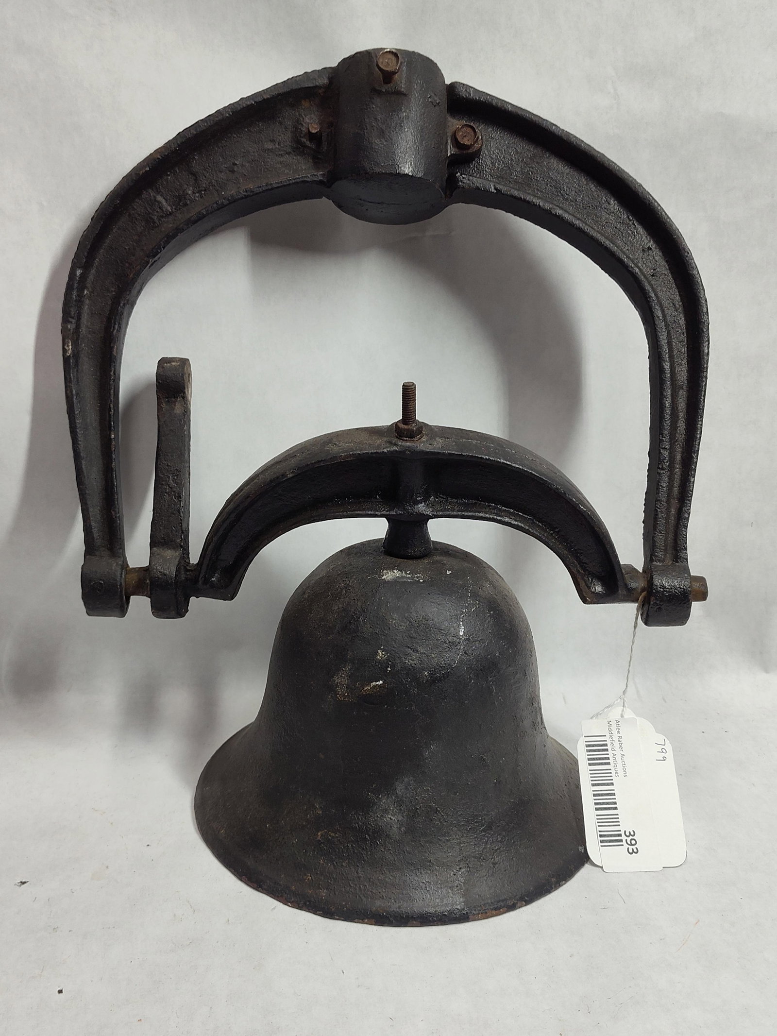 Antique American Cast Iron Farmhouse Bell w/ Frame: This antique cast iron bell assembly is characteristic of the school and plantation bells produced by North American foundries during the late 19th and early 20th centuries. The set comprises the bell