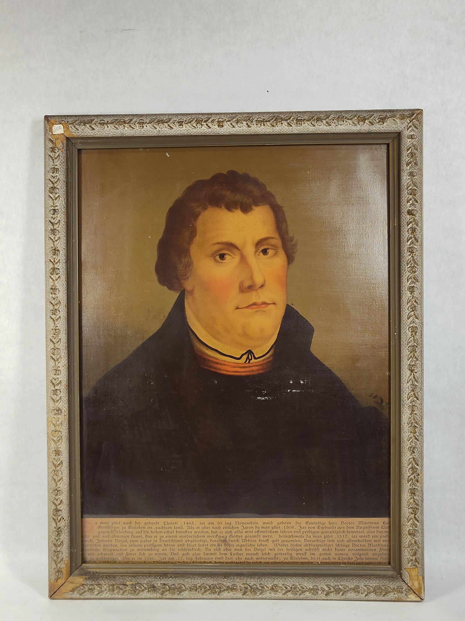 After Cranach the Elder, Martin Luther, Oil/Panel: 17.5x 22.5. This oil on wood panel portrait depicts the Protestant Reformer Martin Luther, rendered in a manner after the workshop of Lucas Cranach the Elder. The subject is portrayed bust-length in