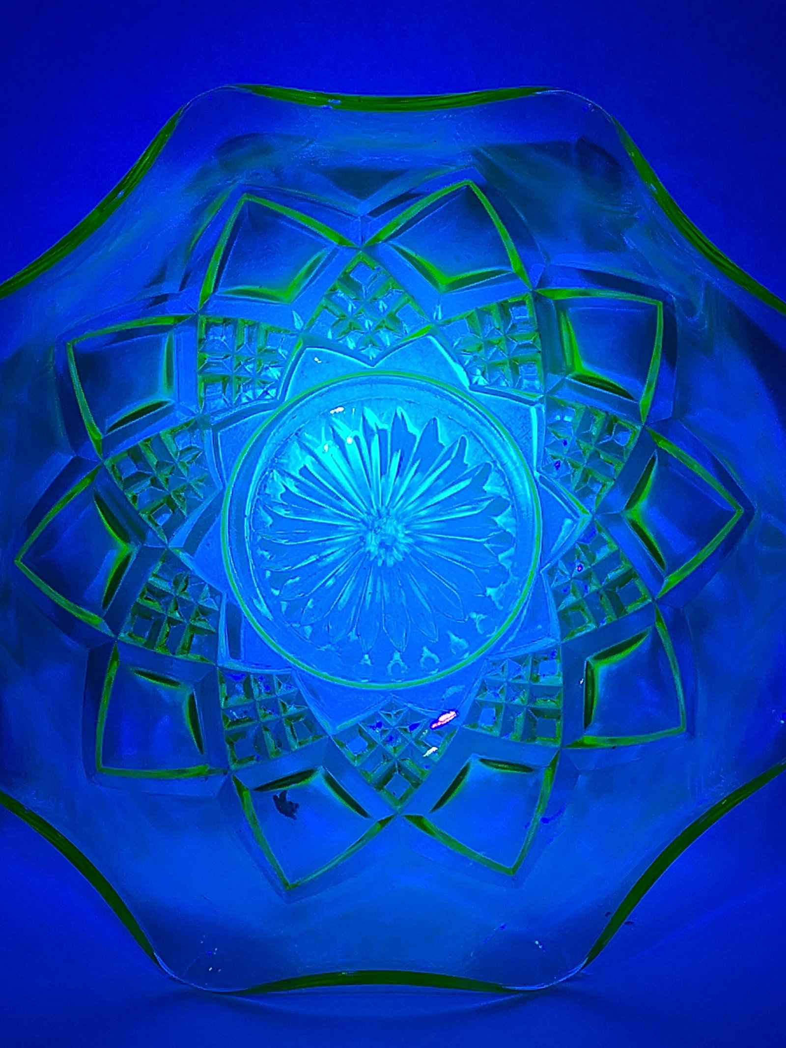Hazel-Atlas Pyramid Green Uranium Glass Bowl Set: This five-piece set of green Depression-era pressed glass bowls was produced in the Pyramid pattern, also known as New Century, by the Hazel-Atlas Glass Company. The set includes one large master