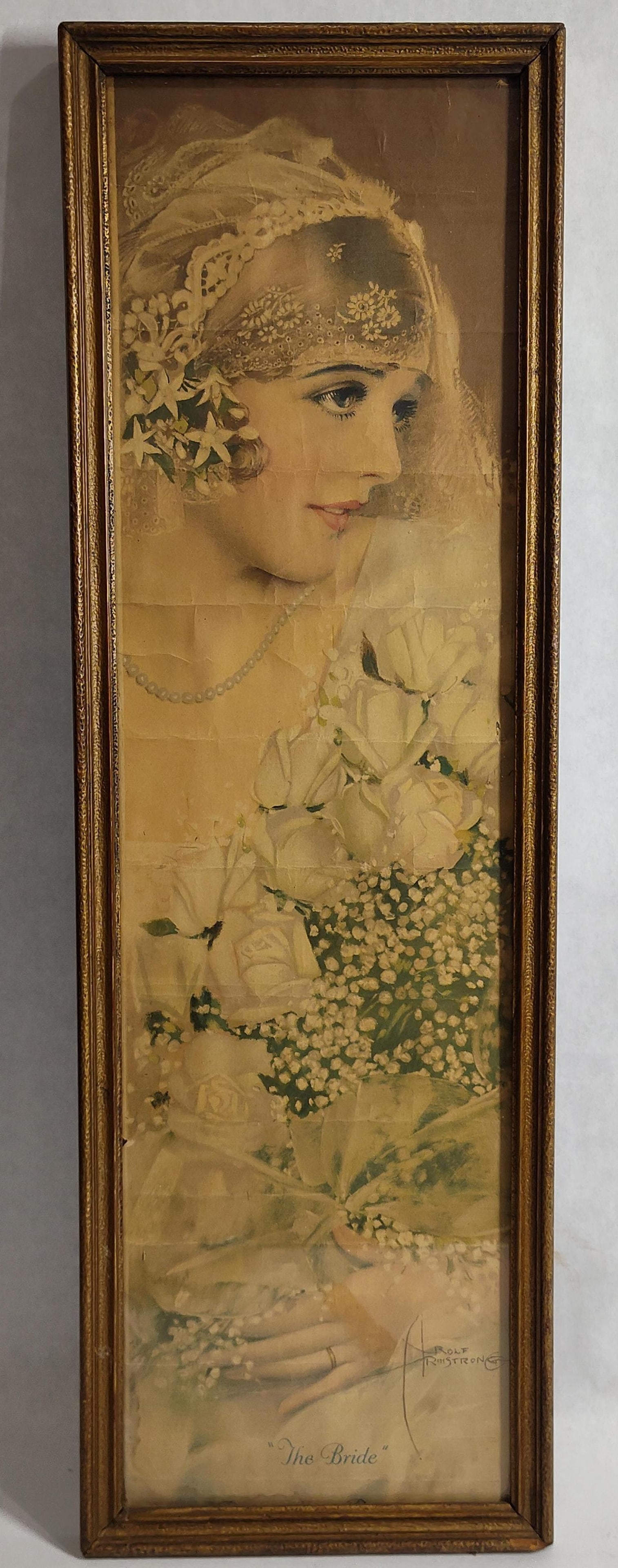 Rolf Armstrong, The Bride, Framed Print: 8x 25. This commercial print, an offset lithograph, is titled The Bride and features a profile portrait of a woman by the American illustrator Rolf Armstrong. The subject is depicted in 1920s-style