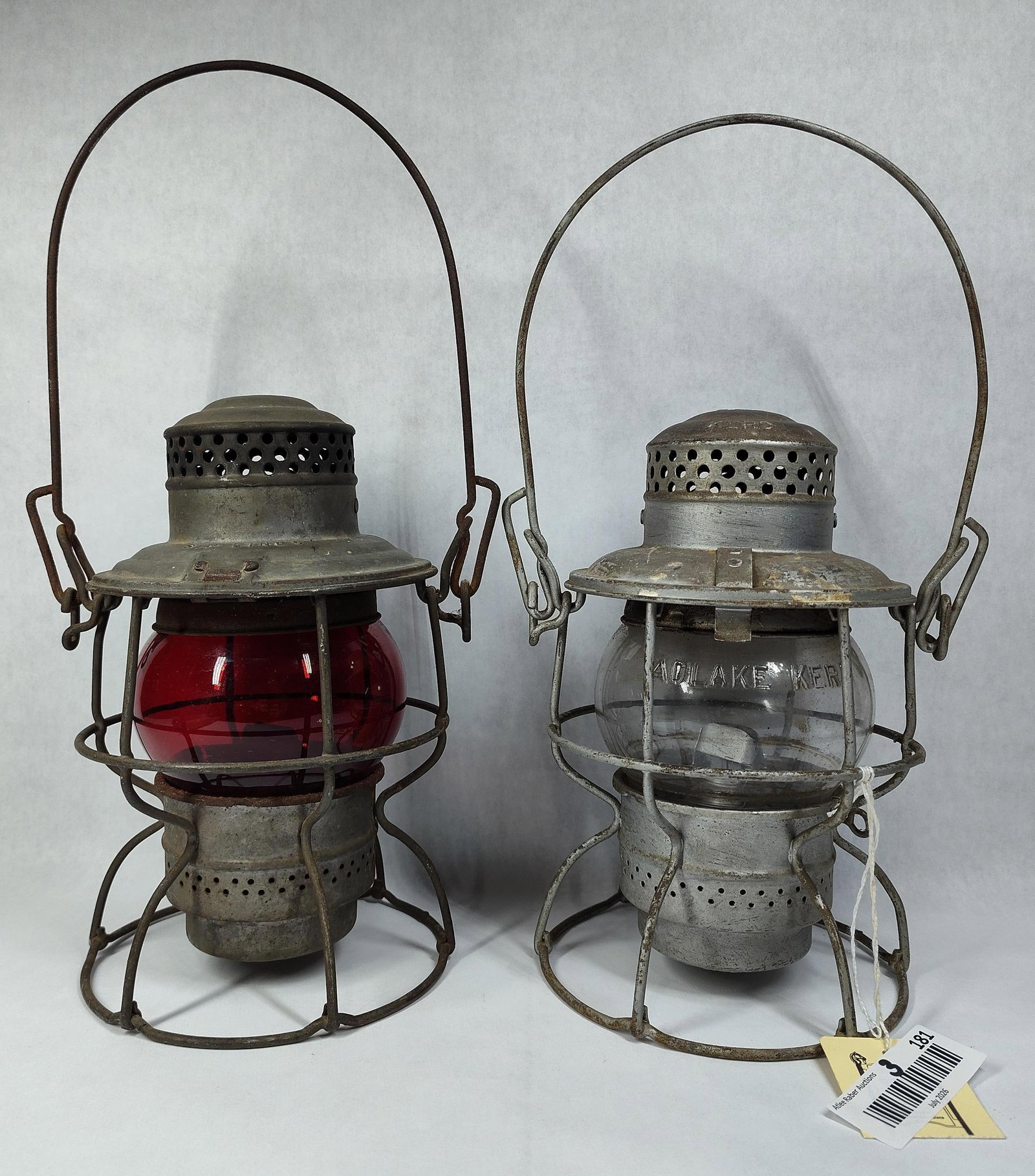 Adlake Kero RR Lanterns: Southern Pacific & C&O: This lot consists of two Adlake Kero railroad lanterns produced by the Adams & Westlake Company. The first lantern is embossed S. P. LINES on the top rim, signifying service with the Southern Pacific 