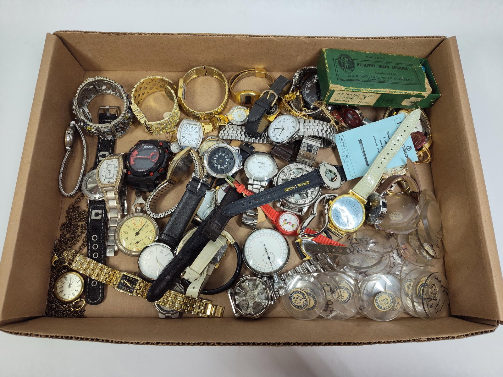 & Modern Wristwatches, Pocket Watches & Parts: A large collection of horological items including various and modern wristwatches, pocket watches, and specialized repair components. Notable timepieces include a New Haven Golfometer, a Harrah's St.
