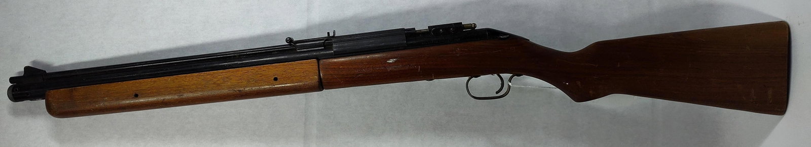 Sheridan Blue Streak Bolt Action Air Rifle 5mm: The Sheridan Blue Streak Model C is a single-shot, bolt-action, multi-pump pneumatic air rifle designed for 5mm (.20 caliber) pellets. This example features a blued finish on the barrel and