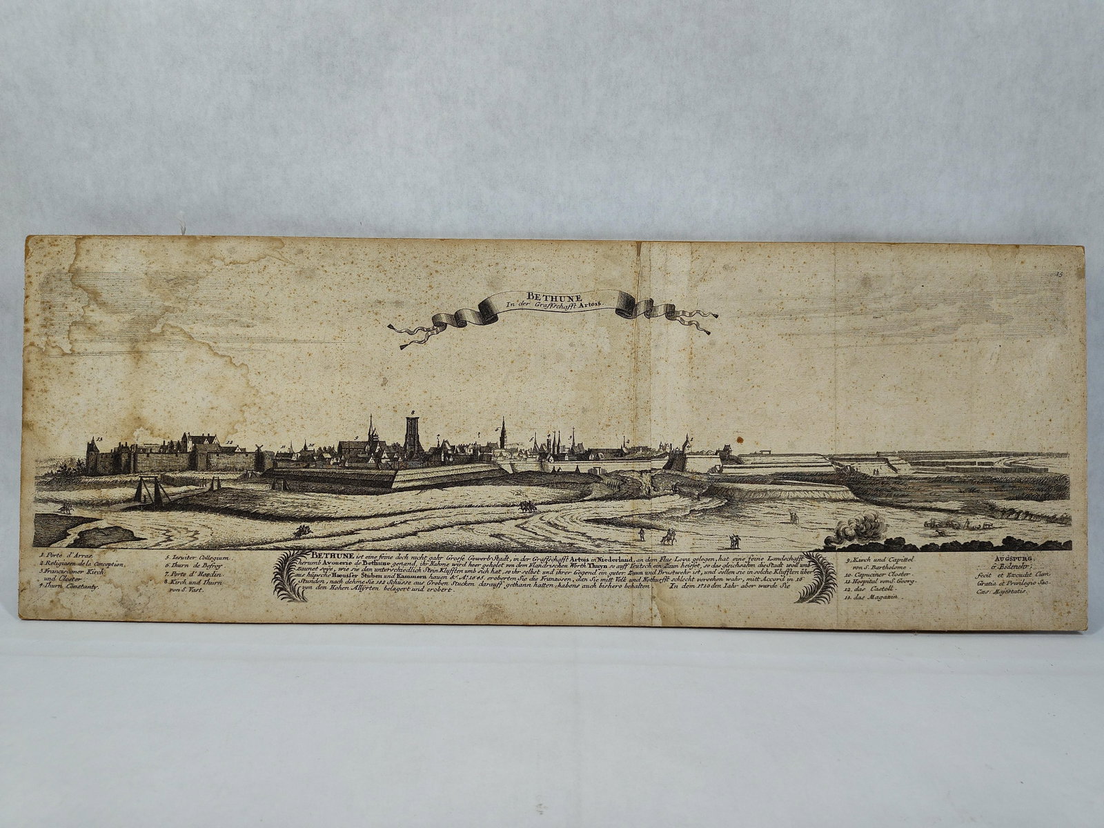 Gabriel Bodenehr, Panoramic Bethune Engraving,: 7.25 x 20. This 18th-century engraving with etched foundations depicts a panoramic view of the fortified town of Bethune, France. The work is titled BETHUNE In der Graffschafft Artois within a