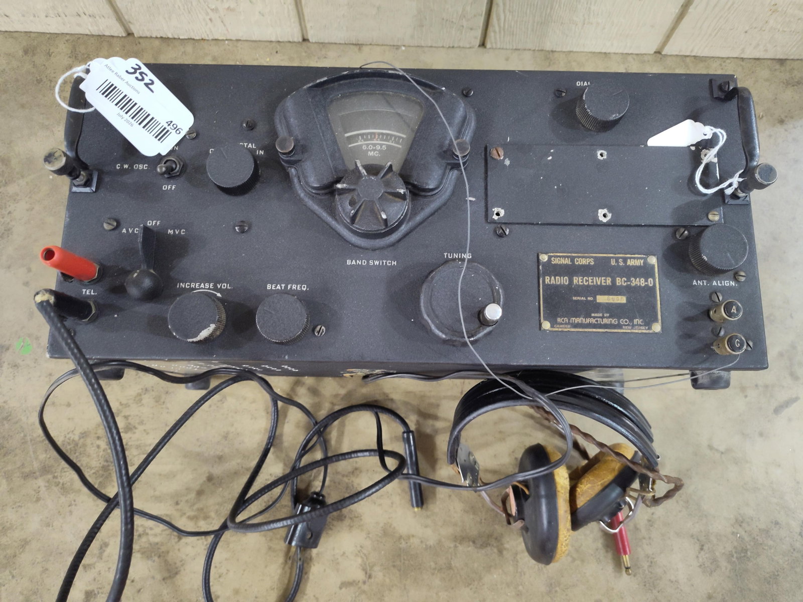 RCA WWII Radio Receiver BC-348-O w/ Headphones: This is a World War II-era US Army Signal Corps airborne radio receiver, model BC-348-O, manufactured by RCA Manufacturing Co., Inc. in Camden, New Jersey. The unit is constructed with a metal