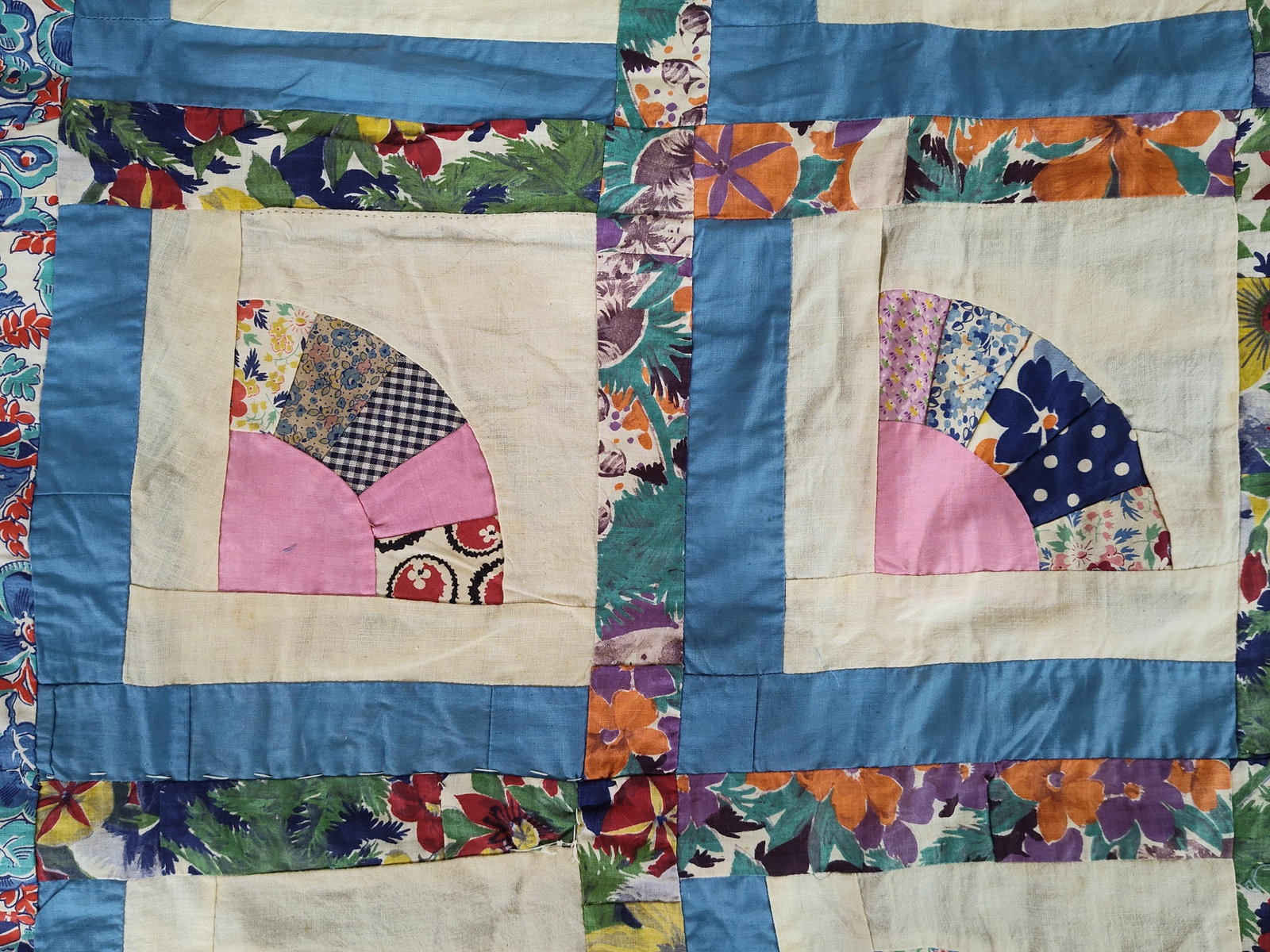 Mid-20th C. Hand-Pieced Cotton Fan Quilt Top: This is a mid-20th century American folk-style quilt top featuring a Quarter Fan pattern. The piece is hand-pieced from various cotton scrap fabrics, including solids, florals, checks, and polka-dot
