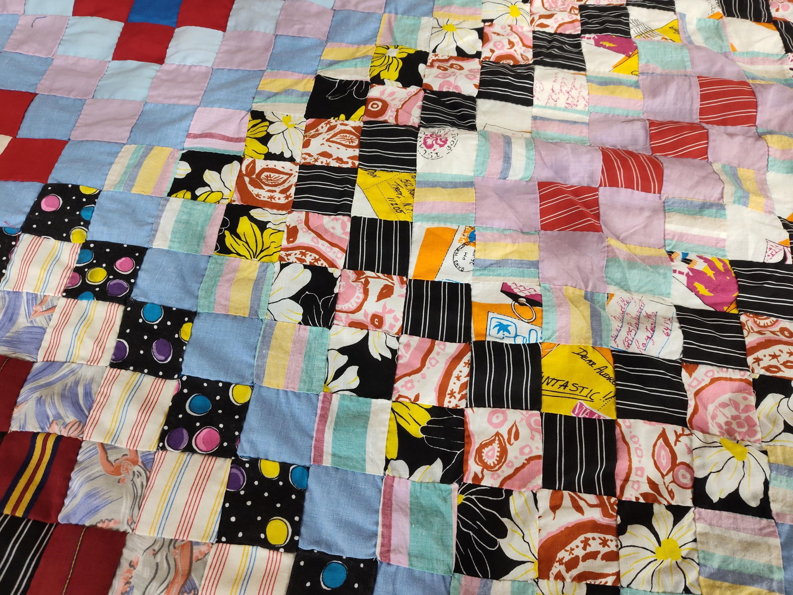 Postage Stamp Patchwork Quilt Top w/ Inscriptions: Hand-pieced postage stamp style patchwork quilt top featuring small fabric squares set on-point. The piece is constructed from a diverse assortment of fabric scraps including cottons and possible