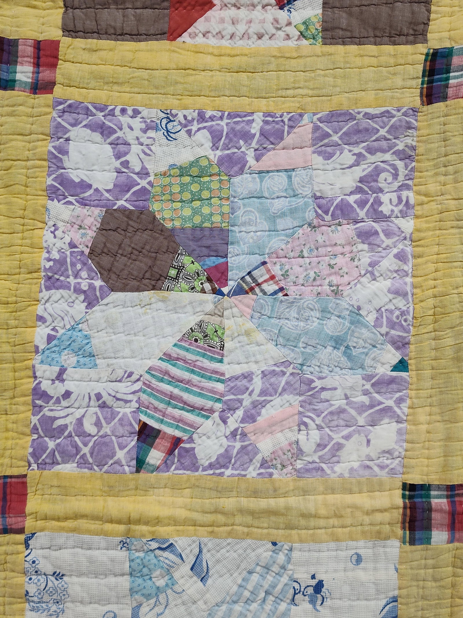 Mid-20th C. American Hummingbird Scrap Quilt: This is a mid-20th-century American hand-quilted patchwork quilt, likely dating from the 1930s to the 1950s. The quilt features sixteen blocks arranged in a four-by-four grid. Each block contains a ce