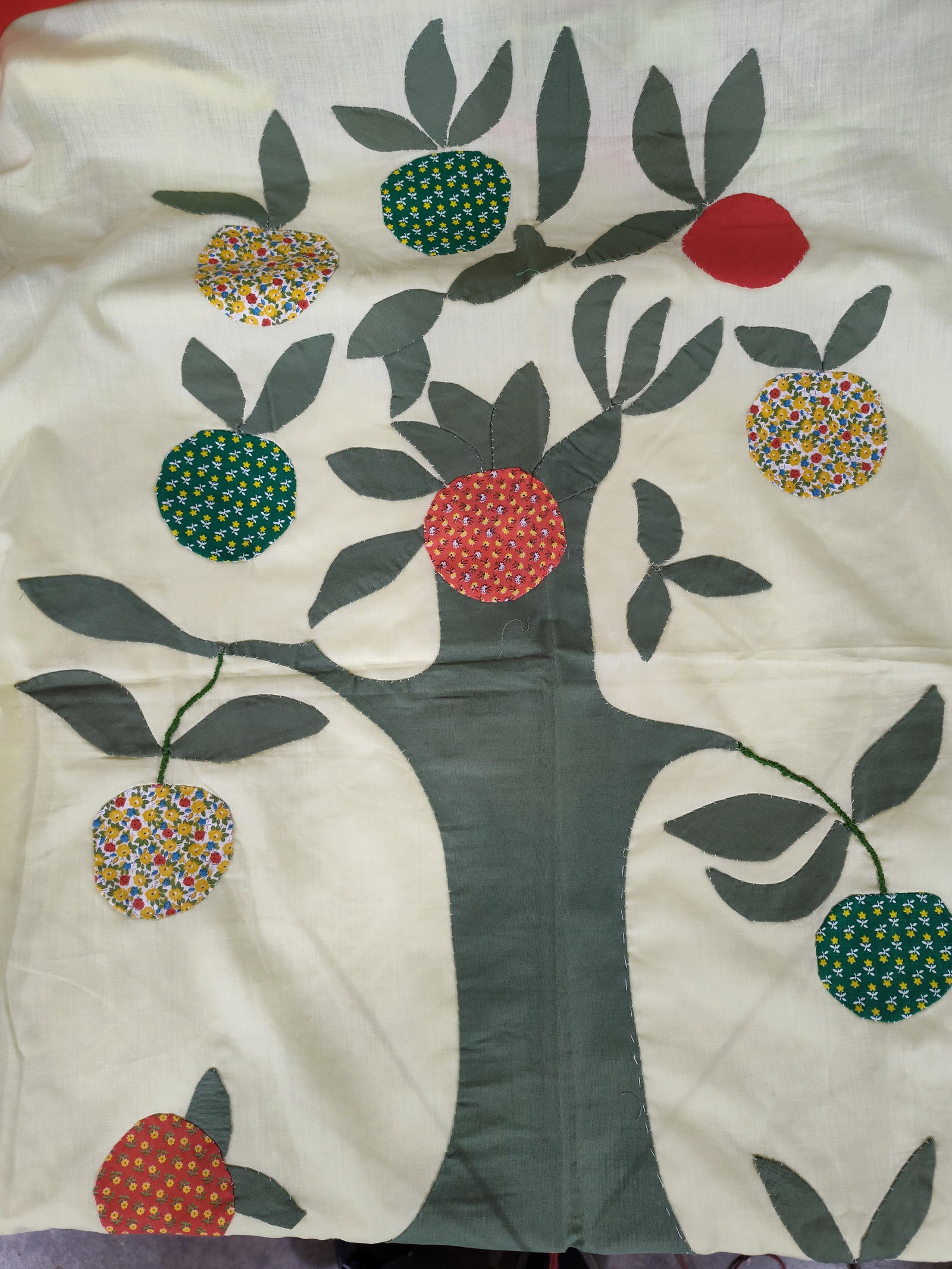 Unfinished Hand Appliqued Tree of Life Quilt Top: This is an unfinished quilt top featuring a central Tree of Life or Apple Tree folk art motif, likely dating from the late 20th century. The piece centers on a large cream-colored panel depicting a st