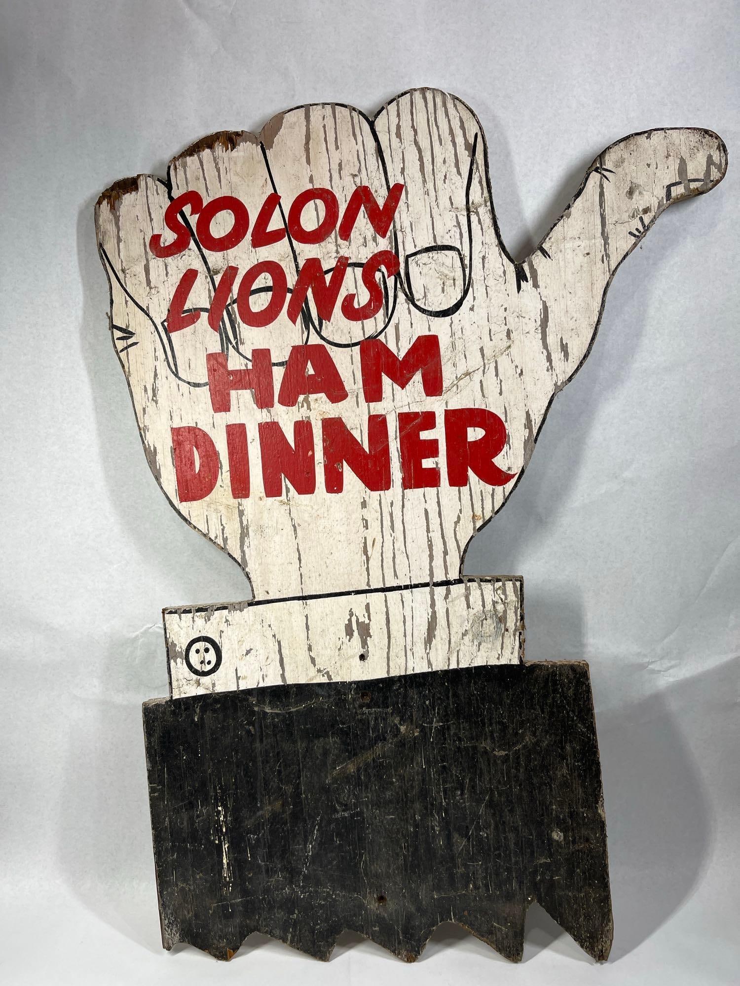 Painted Wood Solon Lions Thumbs-Up Sign: 24x33.5 A mid-century hand-painted wooden advertising sign constructed from thick wood or plywood. The sign is cut into the silhouette of a hand performing a thumbs-up gesture. The surface is painted