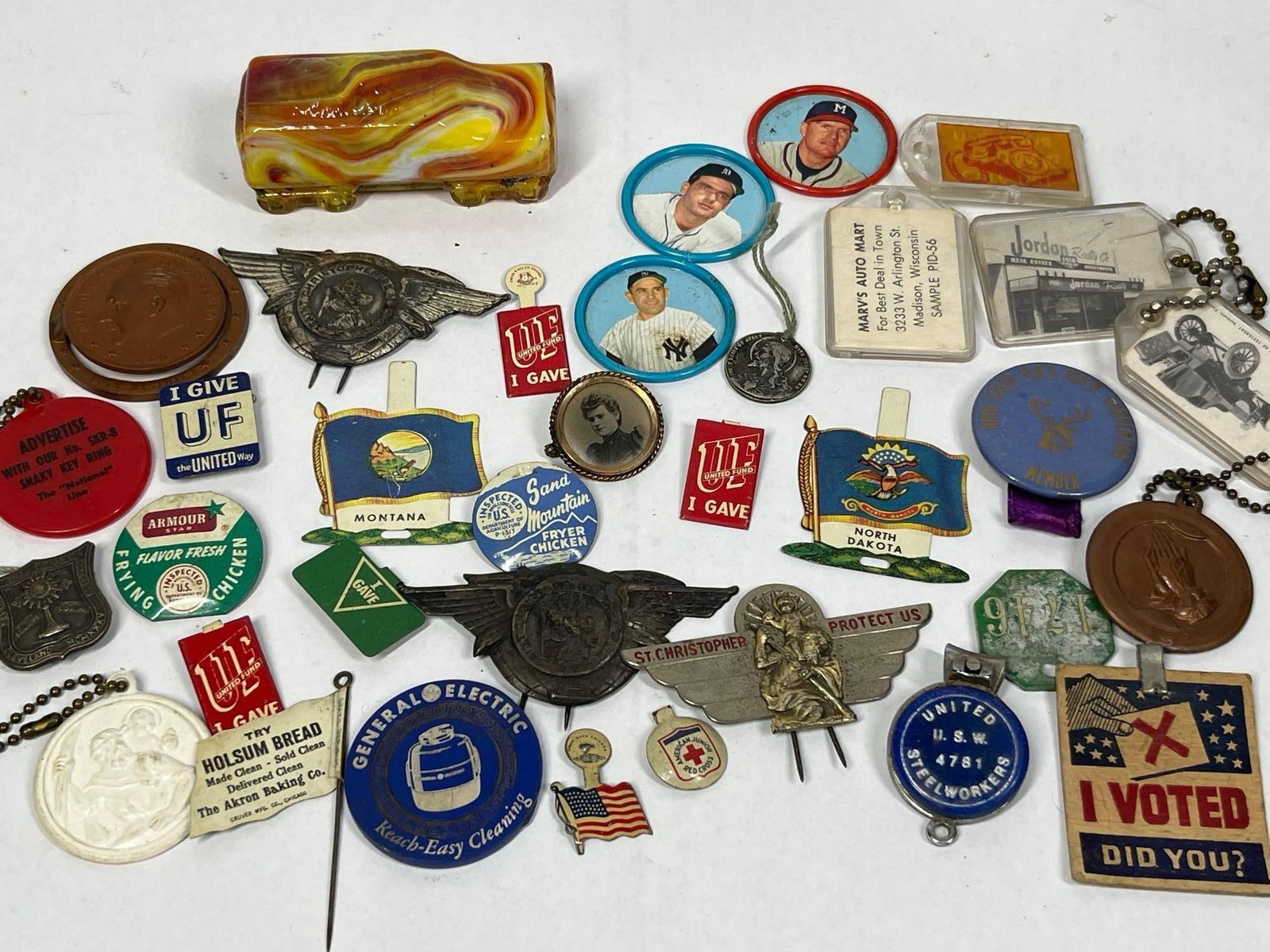 Mid-C. US Advertising & Sports Lot: An assortment of mid-20th-century American collectibles comprising advertising, sports, religious, and social organization items. The collection includes a molded slag glass bus or van figurine with a