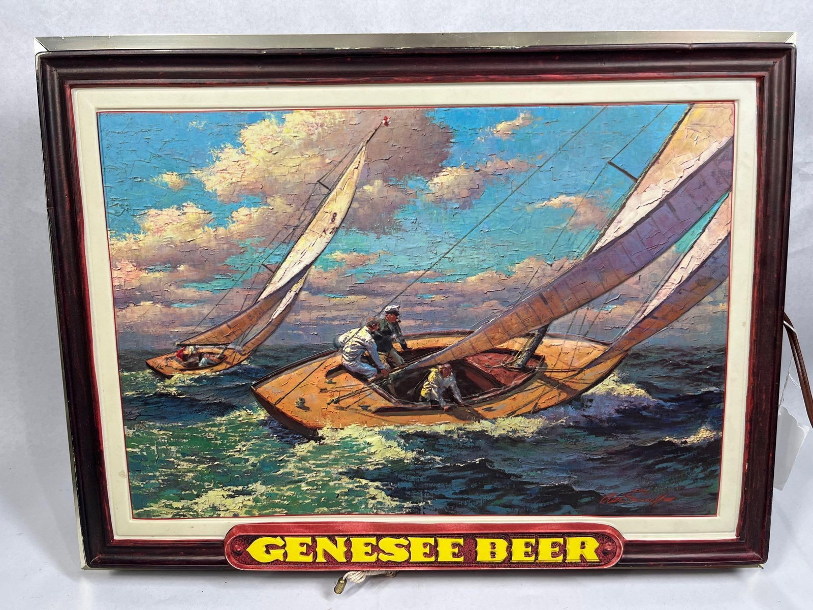 Arthur Sarnoff Genesee Beer Yacht Sign: 15x20 This vintage illuminated advertising sign for Genesee Beer features a central panel depicting a nautical scene of two sailboats racing. The artwork is a commercial reproduction of the painting t