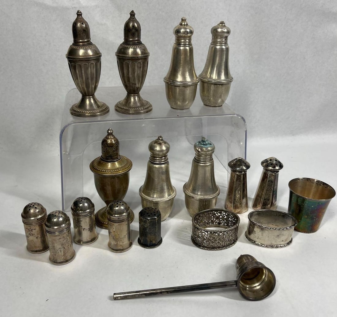 International & Empire Sterling Tableware: This lot consists of a varied group of silver and silver-toned table accessories, featuring items by International Silver Company and other manufacturers. The collection includes several pieces of sol