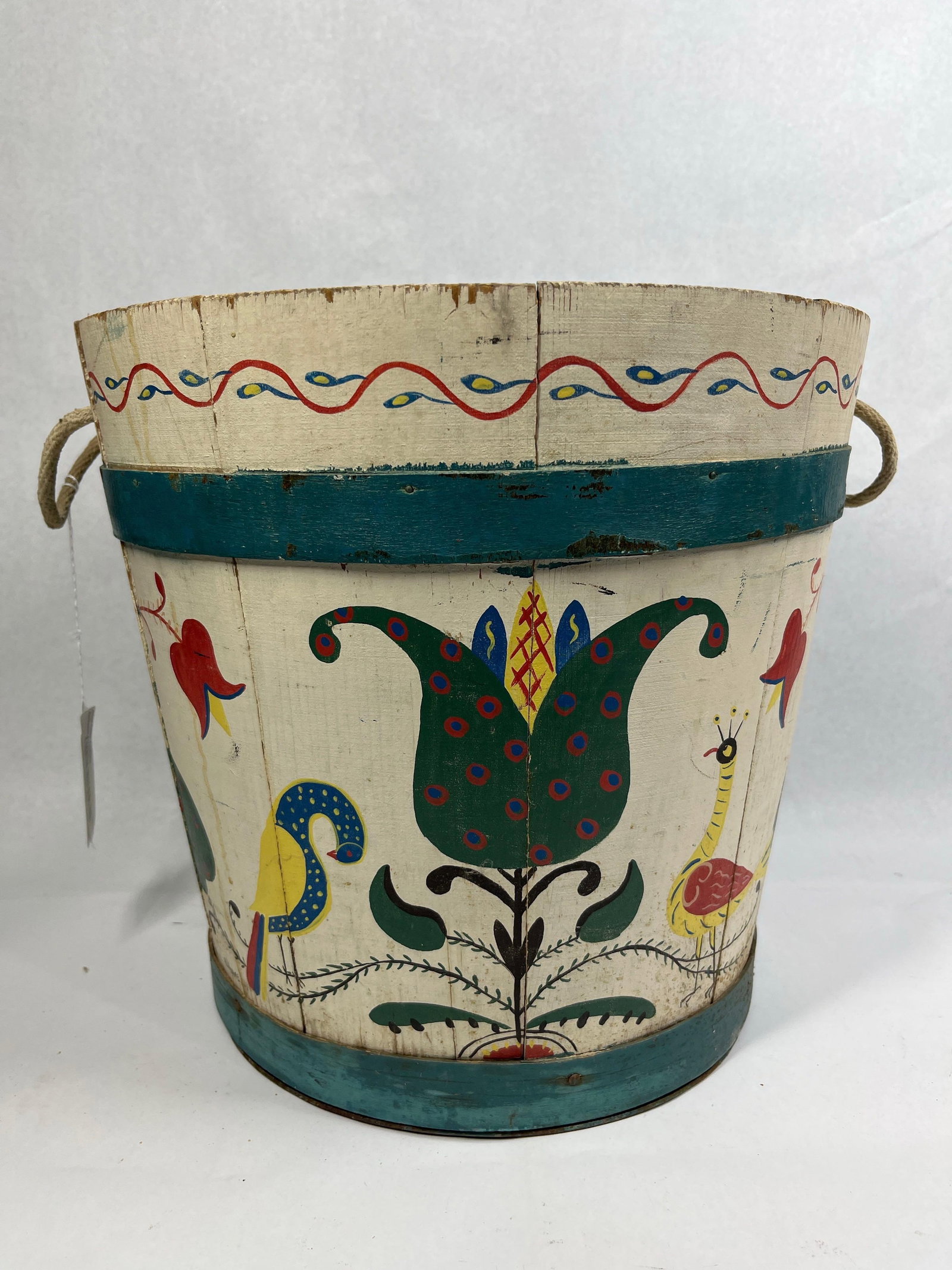 Signed H Hume Hand-Painted Wooden Stave Folk Art Bucket: 12x12.5 This hand-painted wooden stave bucket is decorated in a traditional folk art style and bears the signature H. HUME on the lower exterior. The vessel is constructed of vertical wooden staves
