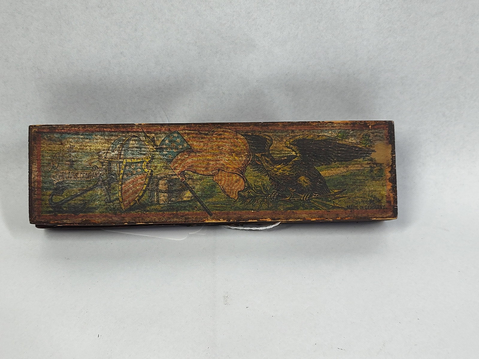Antique German Scholar's Companion Patriotic Lithographed Wooden Pencil Box: 8.5in long This is an antique Scholar's Companion wooden school supply box, manufactured in Germany for the United States market during the late 19th or early 20th century. The box is constructed of s