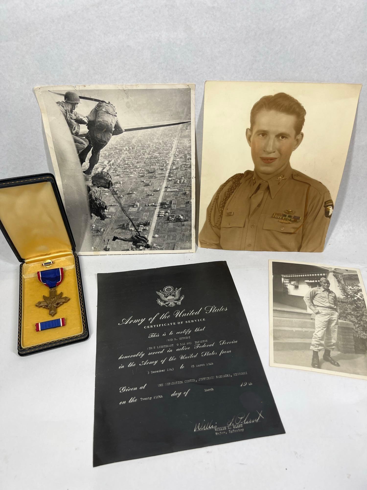 A Collection of WWII US Army 101st Airborne 502nd PIR 1st Lt. Fred R. Metheny Militaria Including: This historical military grouping is attributed to First Lieutenant Fred R. Metheny (O 532 283) of the 502nd Parachute Infantry Regiment, 101st Airborne Division. The primary item is a United States A