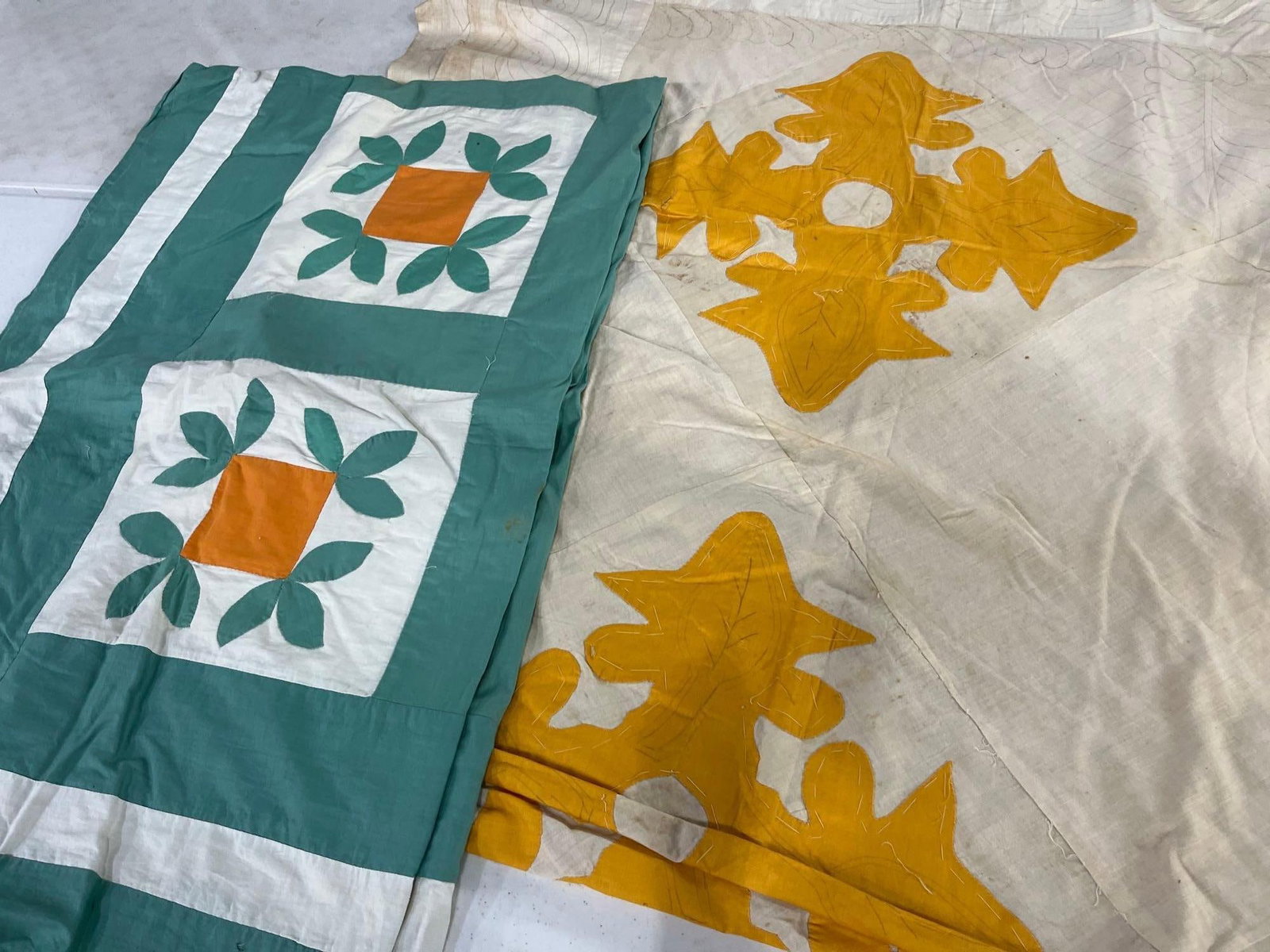 Two American Applique Quilt Tops: Approx 76x80in each This lot consists of two vintage, unfinished quilt tops dating to the mid-20th century. Both pieces represent American vernacular textile traditions and consist only of the top