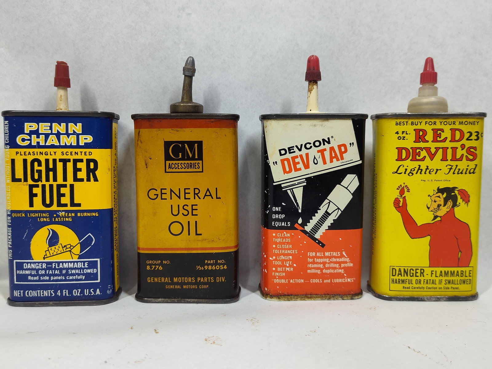 GM, Penn Champ, Devcon & Red Devil Cans (1 of 2)