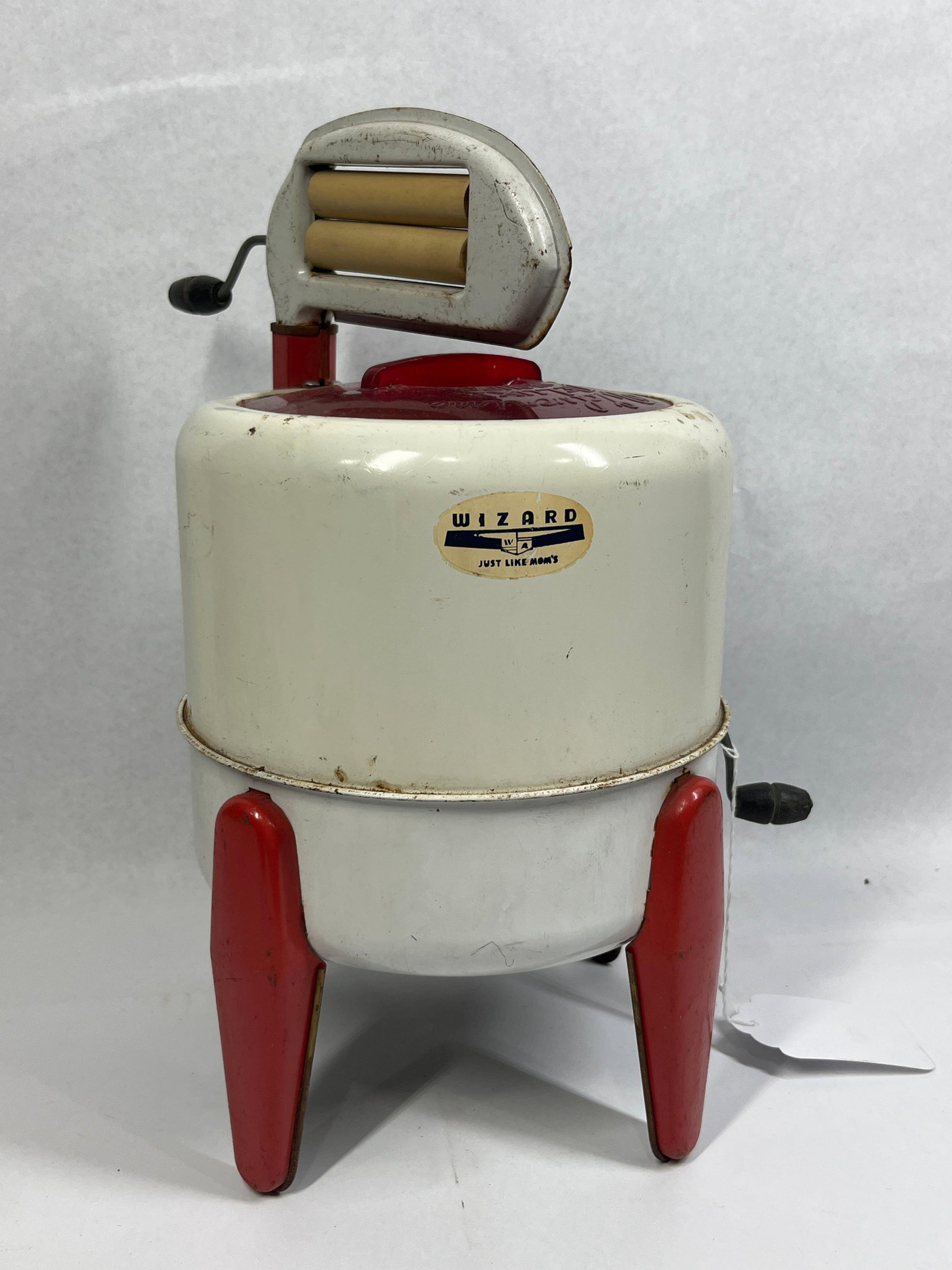 Wolverine Wizard Gibson Toy Washer: Attributed to the Wolverine Supply and Manufacturing Company, this toy wringer washing machine was produced for the Western Auto Supply Company under their private Wizard brand. The toy is modeled