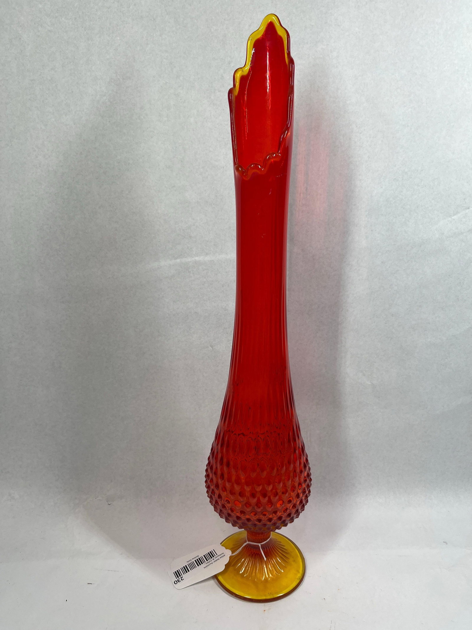 Viking Glass Amberina Swung Art Vase: 22in A tall mid-century modern swung art glass vase, attributed to the Epic line by Viking Glass Company. The vessel features the Amberina colorway, showcasing a gradient that transitions from a deep