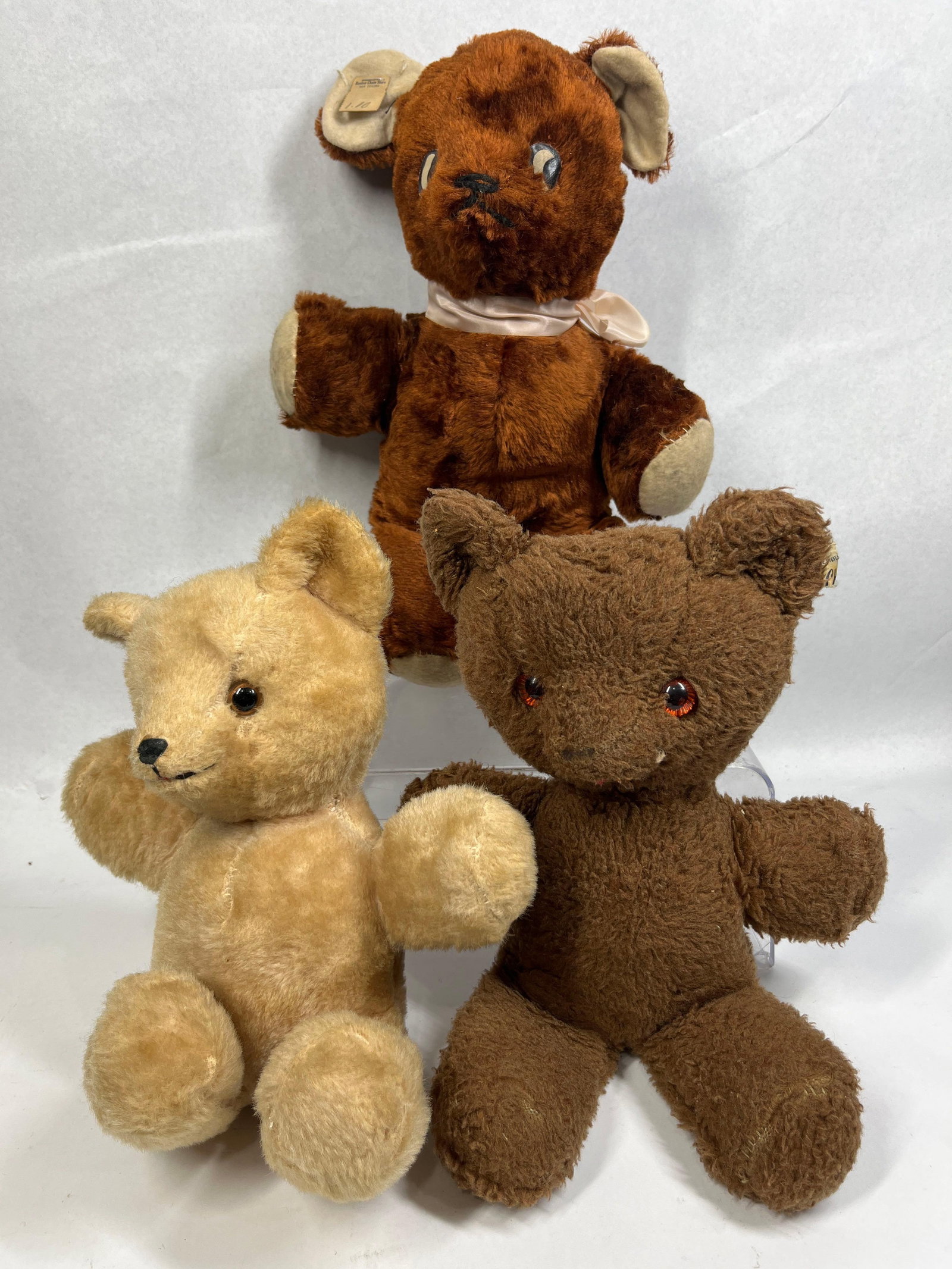 3 Character Musical & Mizpah Pixy Bears: 12in tall ea. This collection consists of three vintage teddy bears of varying manufacturers and designs. The first bear is a reddish-brown plush bear manufactured by the Mizpah Novelty Corp. of