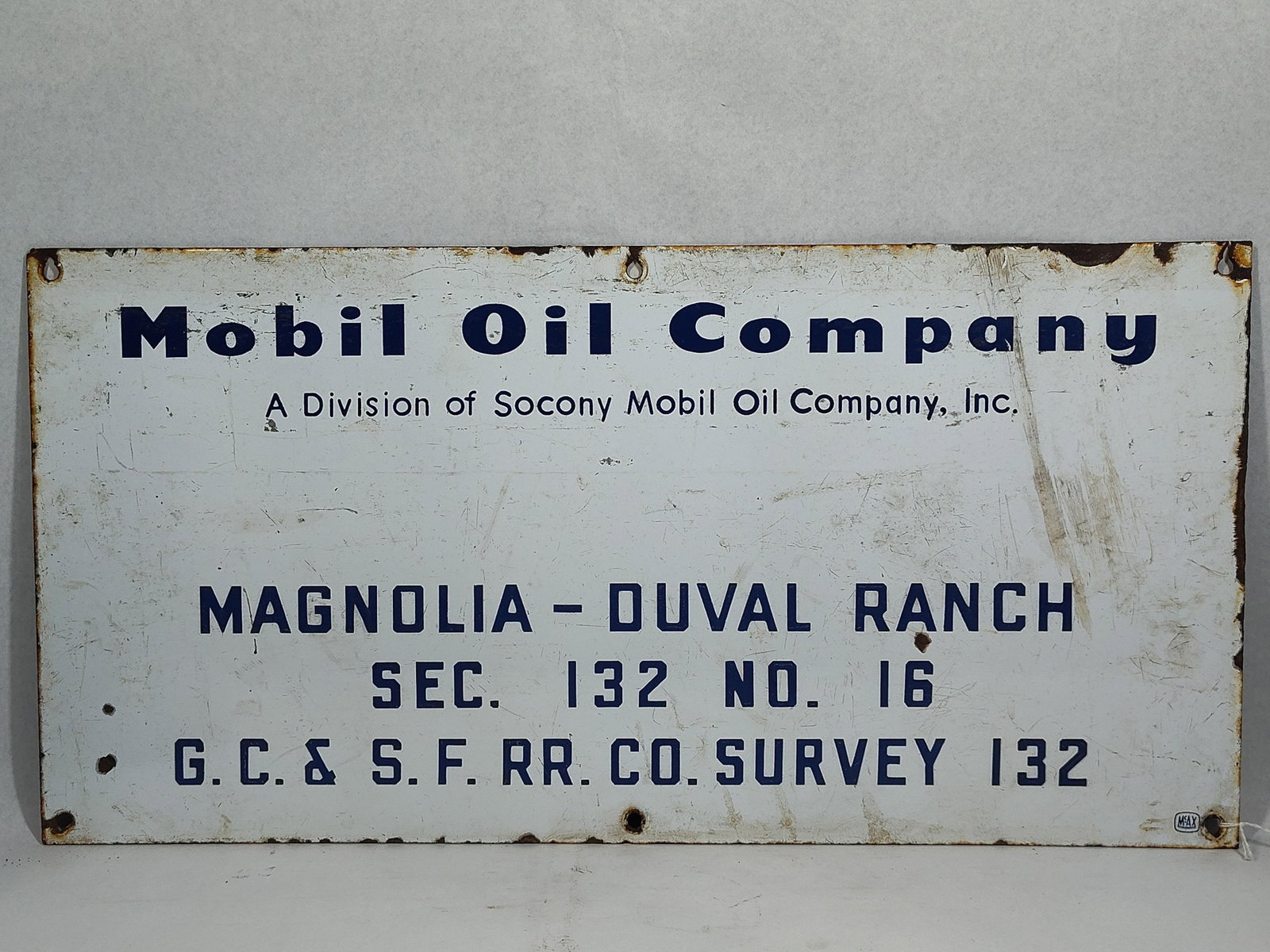 Mobil Socony Oil Field Lease Porc. Sign: 24x12 This is a rectangular porcelain enamel on steel oil field lease sign for the Mobil Oil Company, dating to the mid-20th century. The sign features dark blue block lettering set against a white