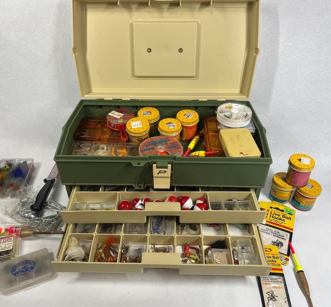 Plano 707 Tackle Box w/ Tackle: This is a vintage Plano Model 707 tackle box constructed from forest green and tan plastic. The box features a multi-tier design with three pull-out drawers and a large top-opening storage compartment